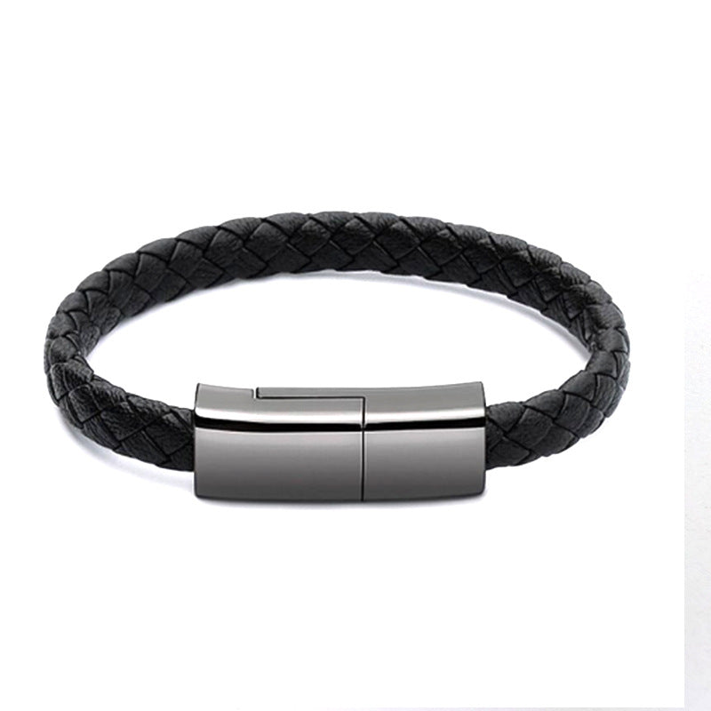 Black braided leather bracelet with a silver clasp on a white background