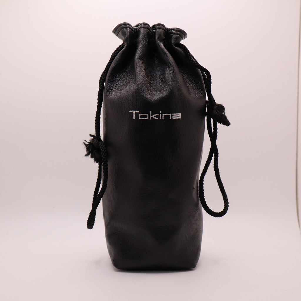 Black drawstring pouch with 'Tokina' branding on a white background