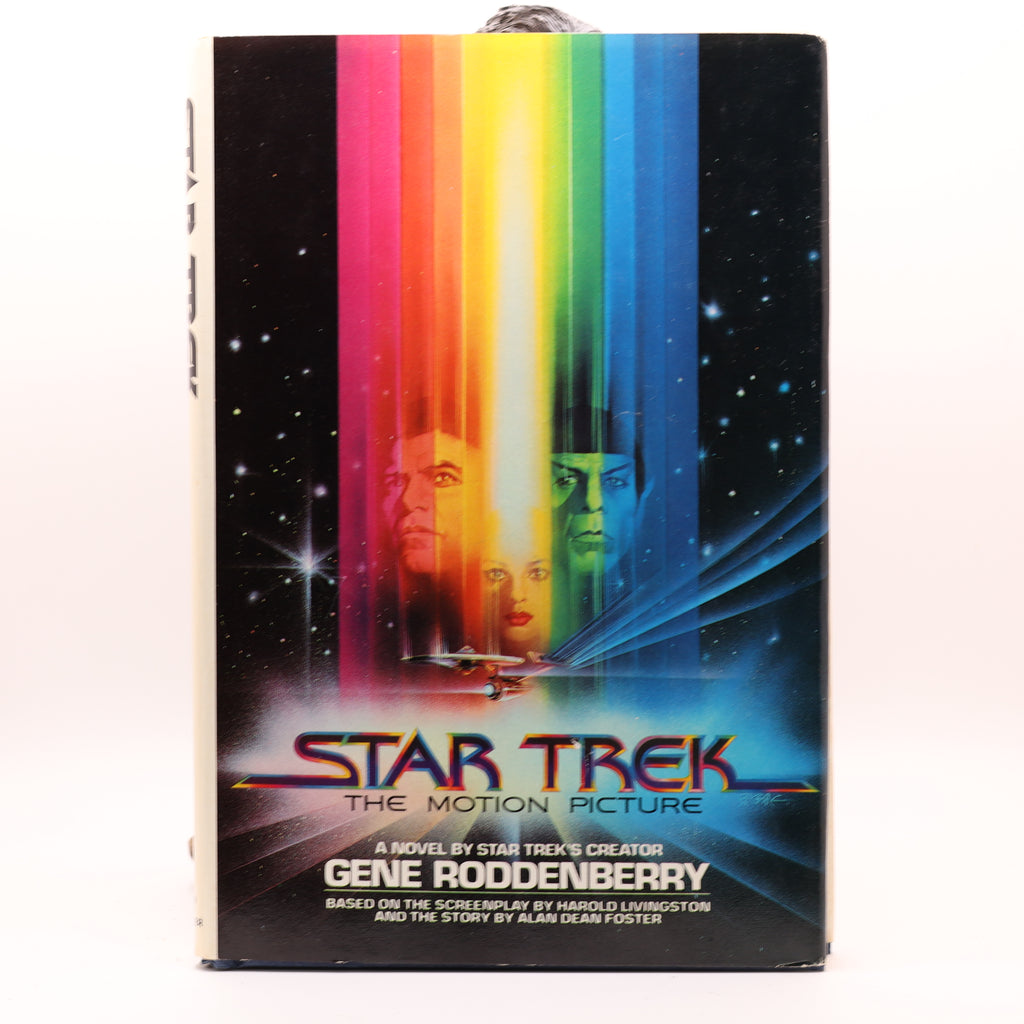 Book cover of 'Star Trek: The Motion Picture' by Gene Roddenberry with colorful design and spaceship illustration.