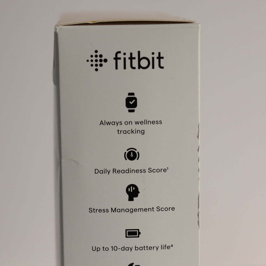 Fitbit product box with features listed on a gray background