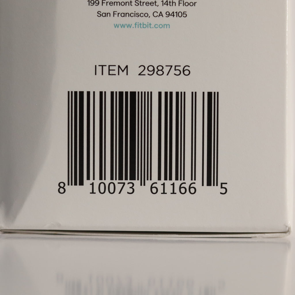 Barcode and text on a Fitbit product packaging