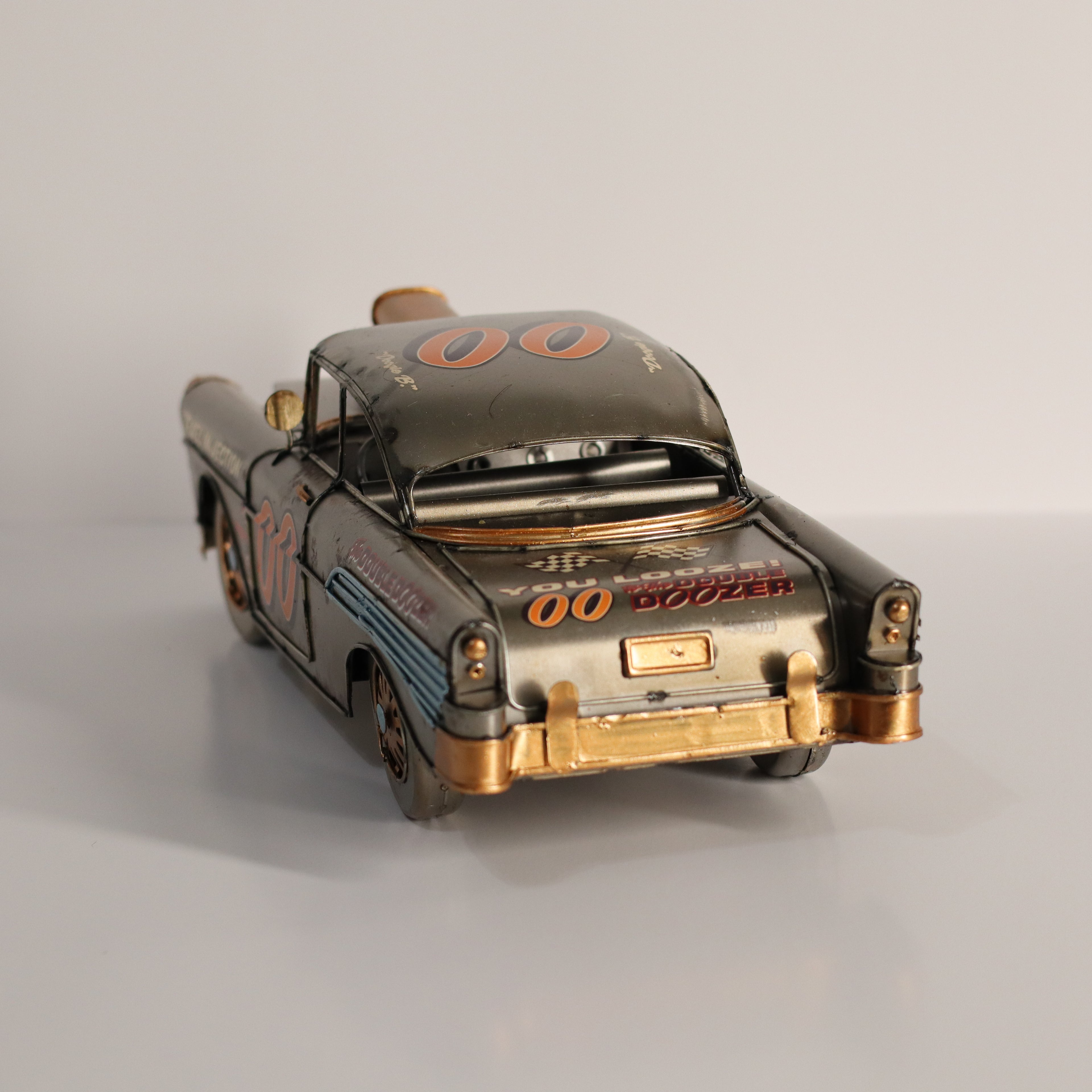 Model car with vintage design on a gray background