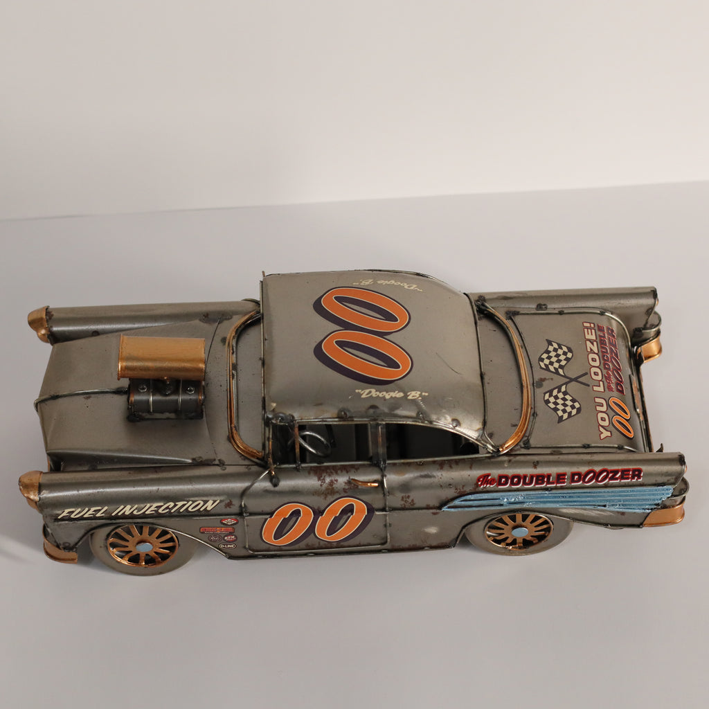 Model of a vintage race car with 'Double Dozer' branding on a gray background