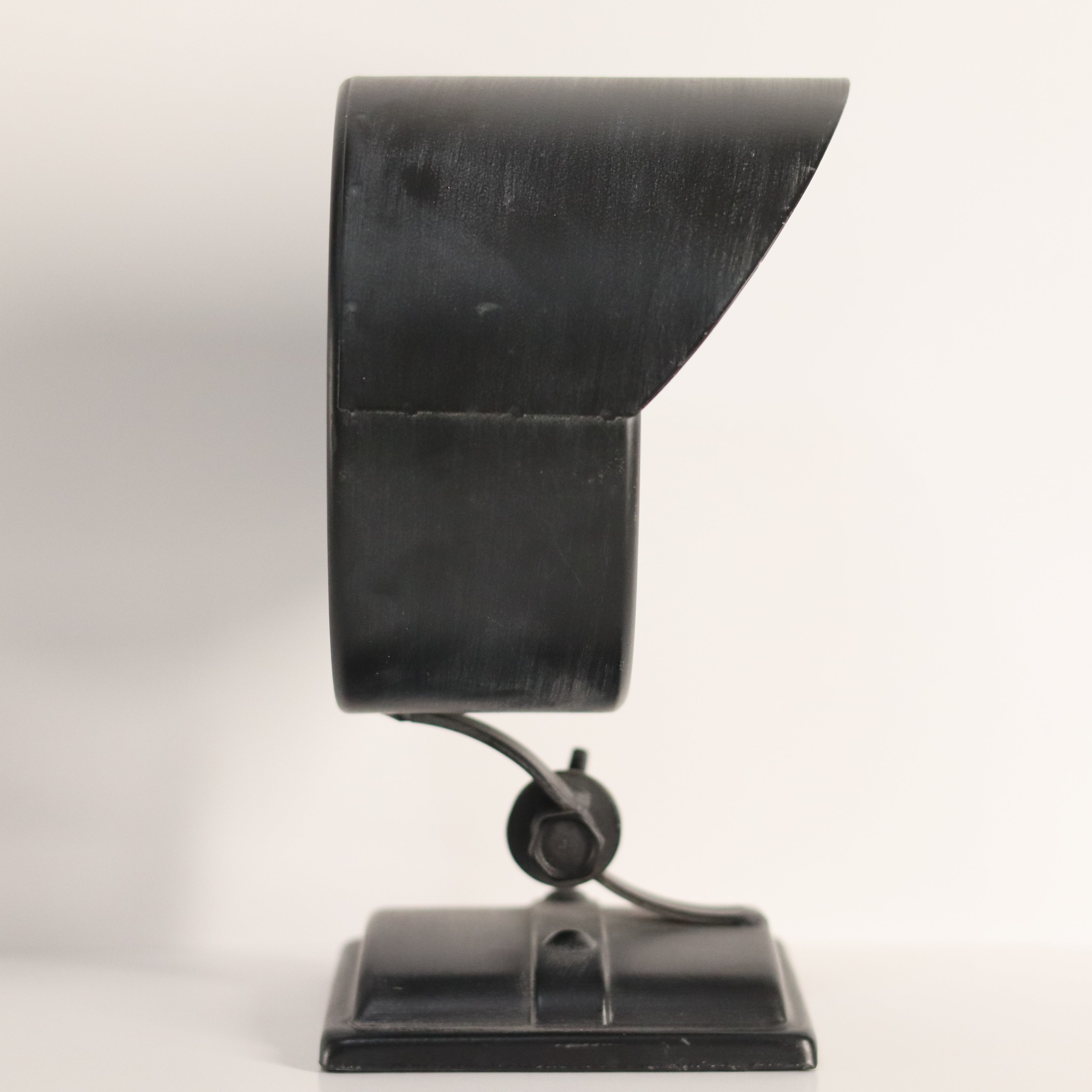 Black vintage-style camera on a white background