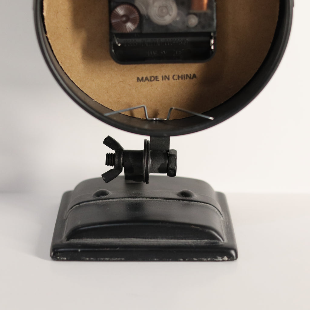 Vintage-style microphone with 'Made in China' label on a white background