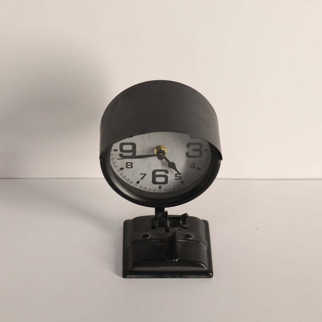 Black clock on a white background