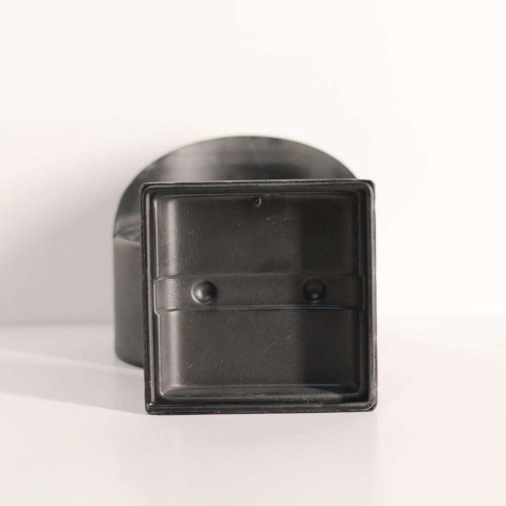 Black metal bracket on a white background