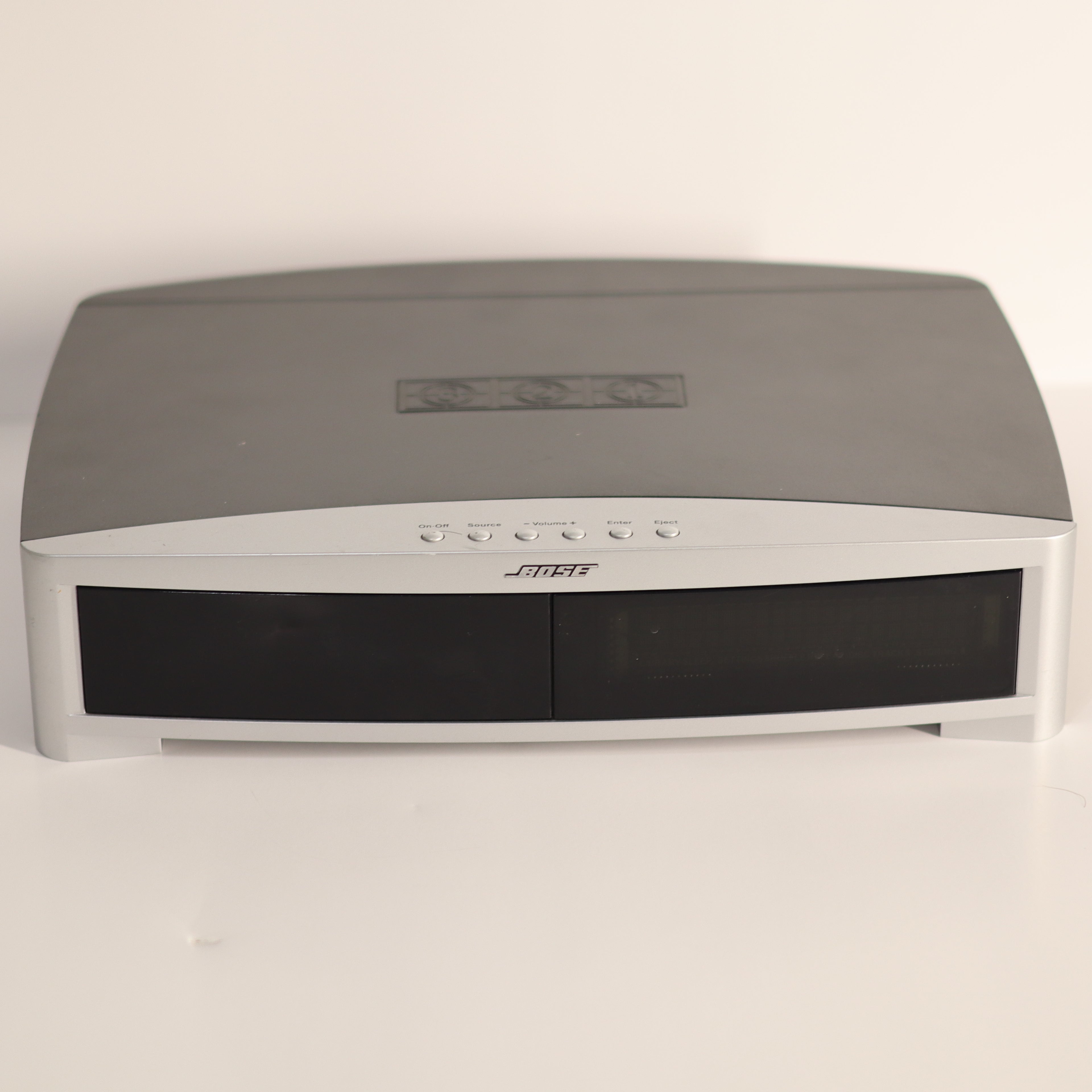 Electronic device with a gray top and black bottom on a white background