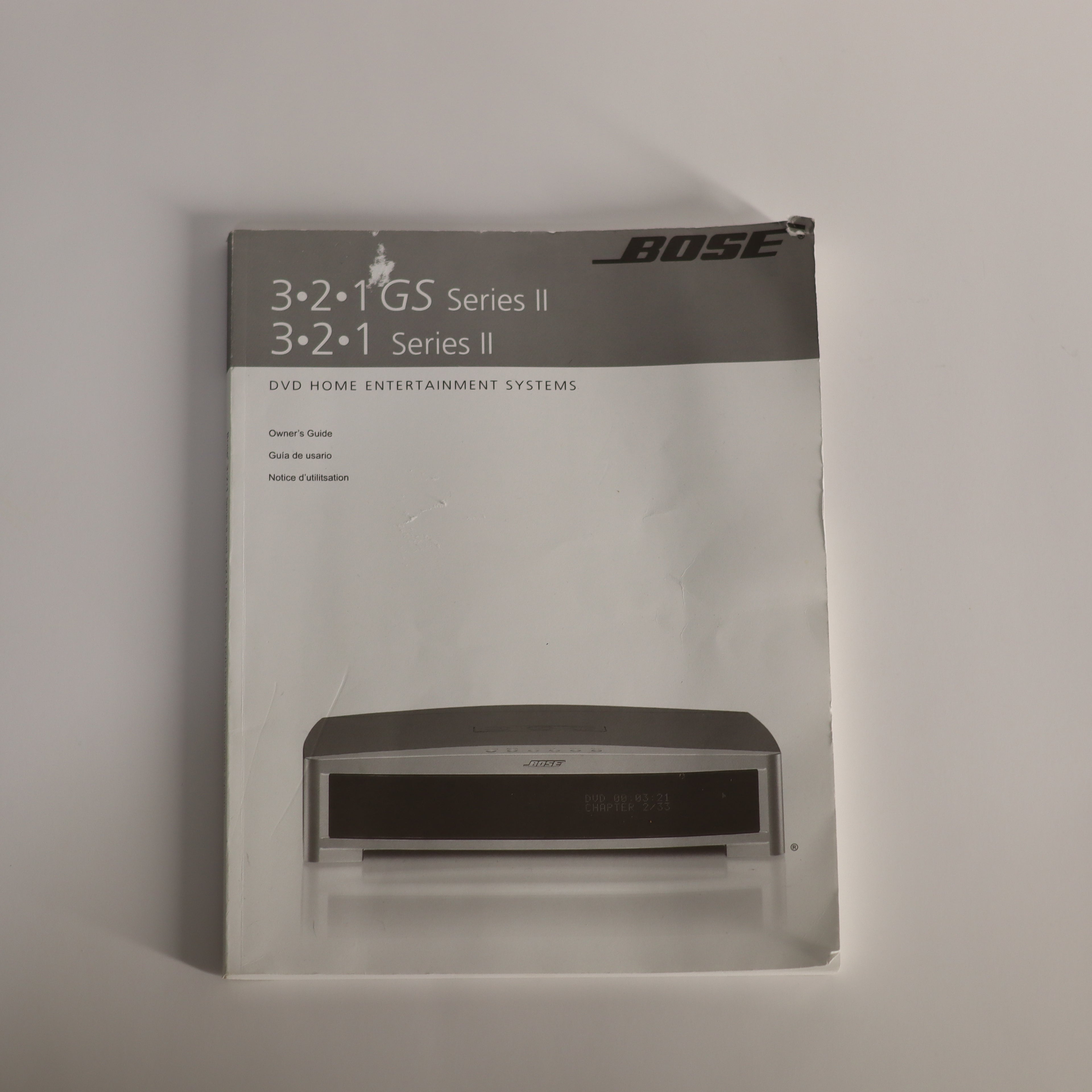 Bose DVD home entertainment system packaging on a light gray background