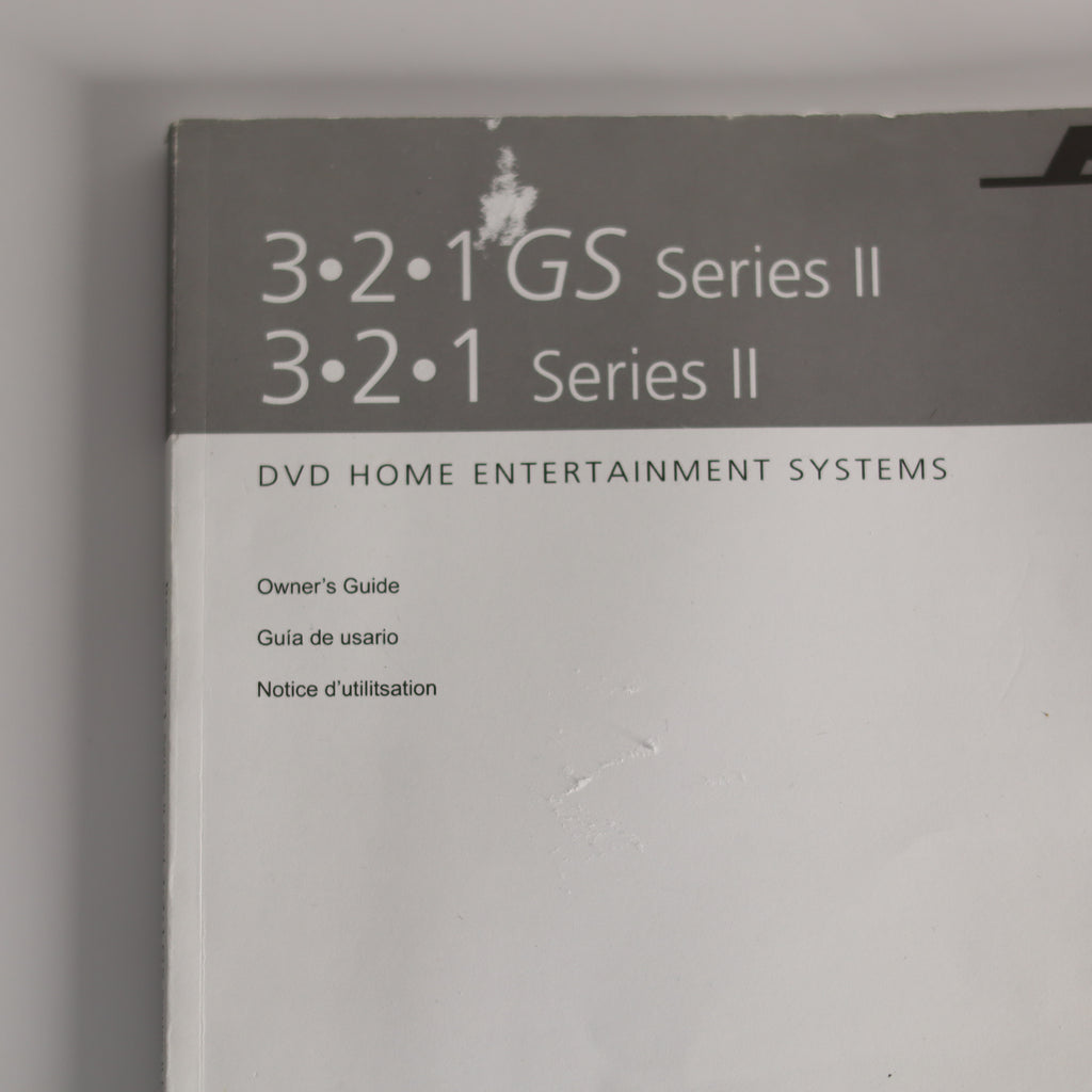 Owner's guide for 321 GS Series II DVD home entertainment system on a gray background