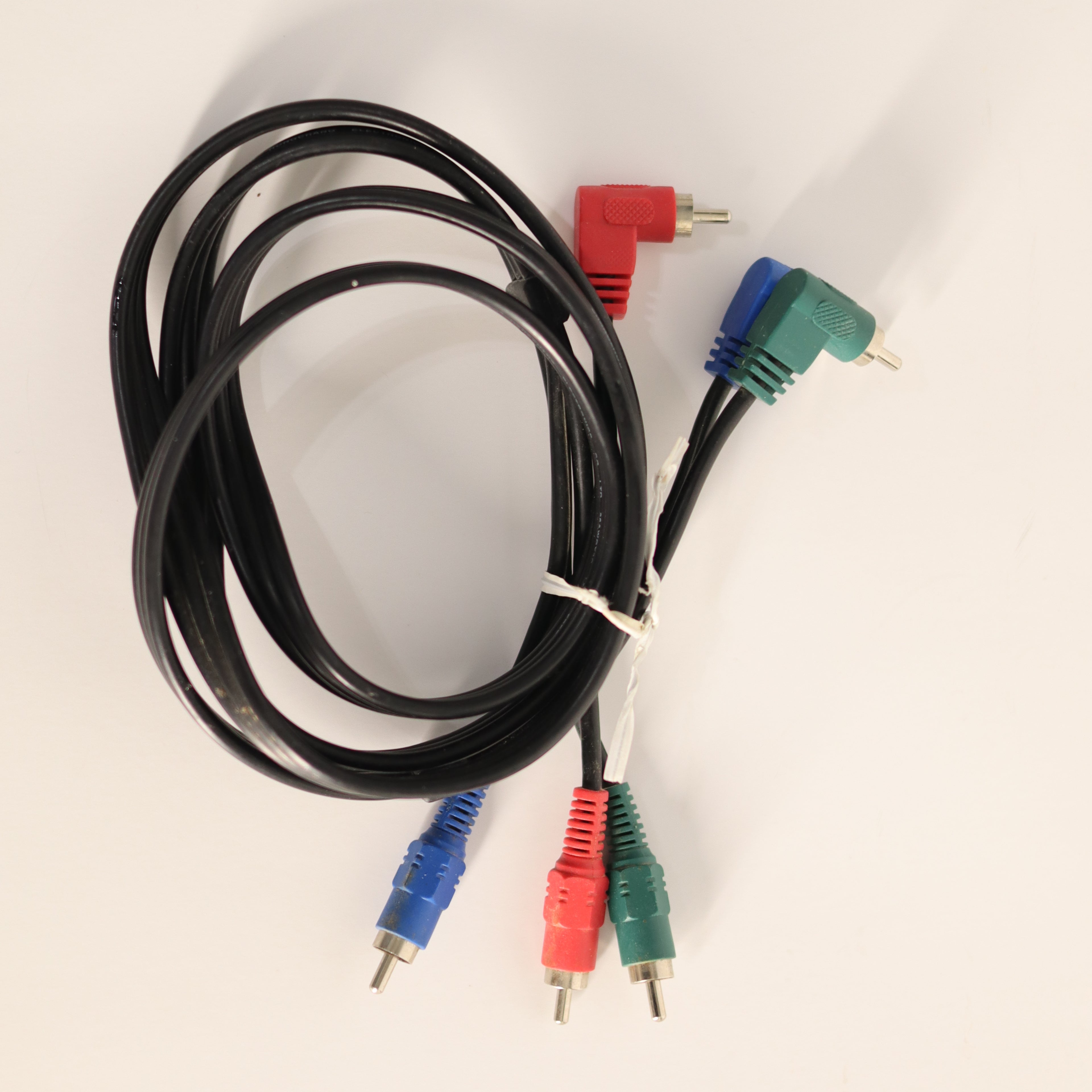 Black audio/video cable with colorful plugs on a white background