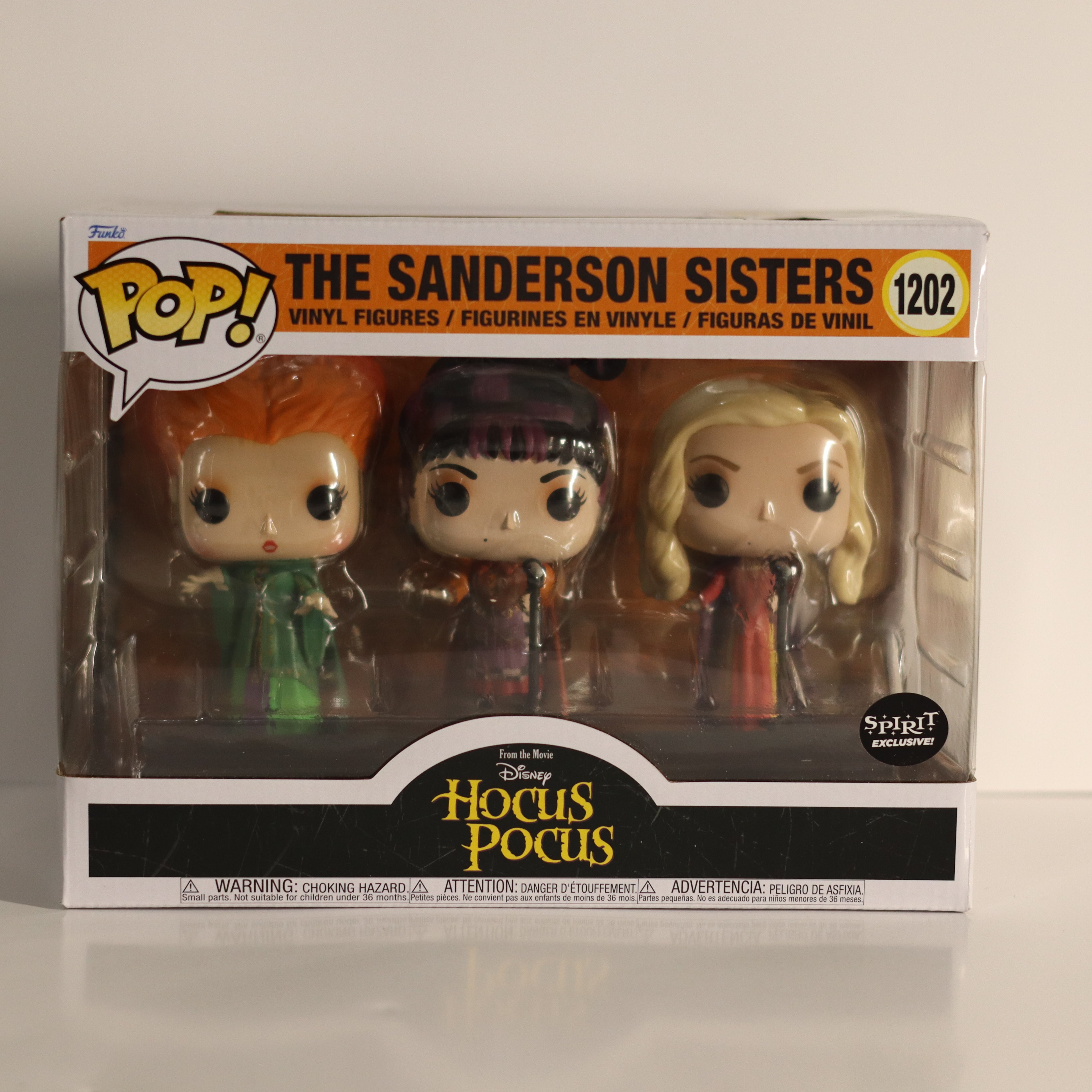 Funko Pop! packaging of The Sanderson Sisters from Hocus Pocus on a beige background