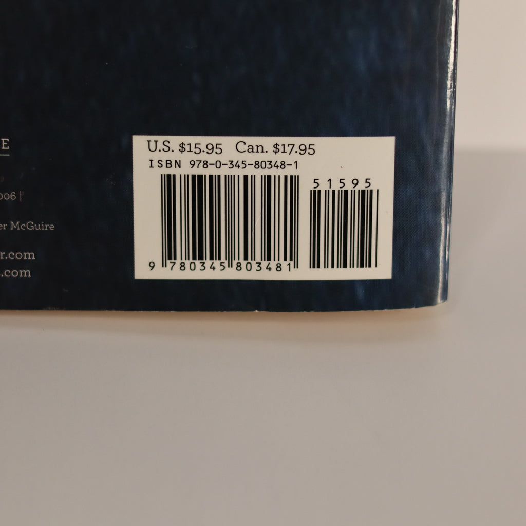 Back cover of a book with a barcode and pricing information.