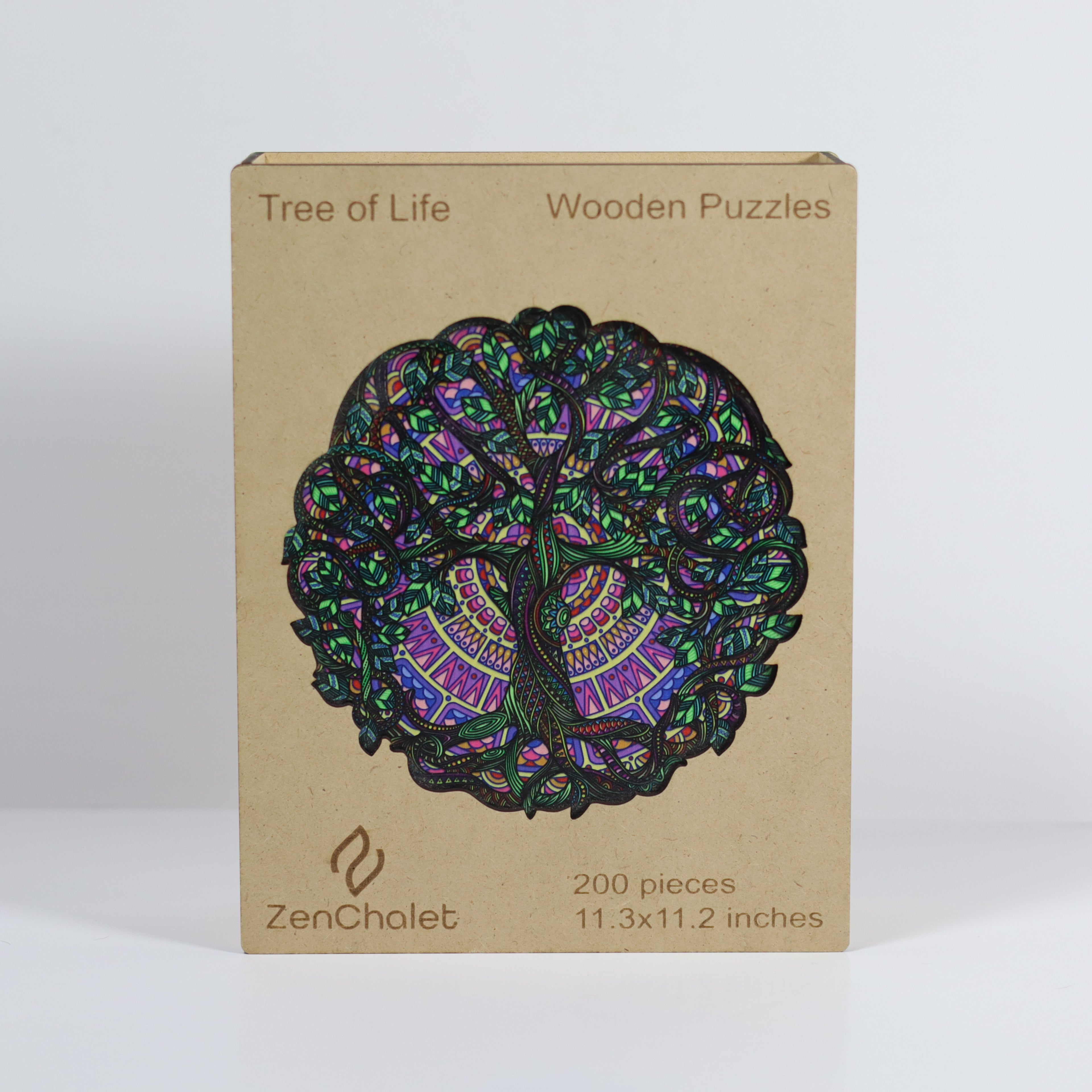 Box of Tree of Life wooden puzzles by ZenChalet on a white background