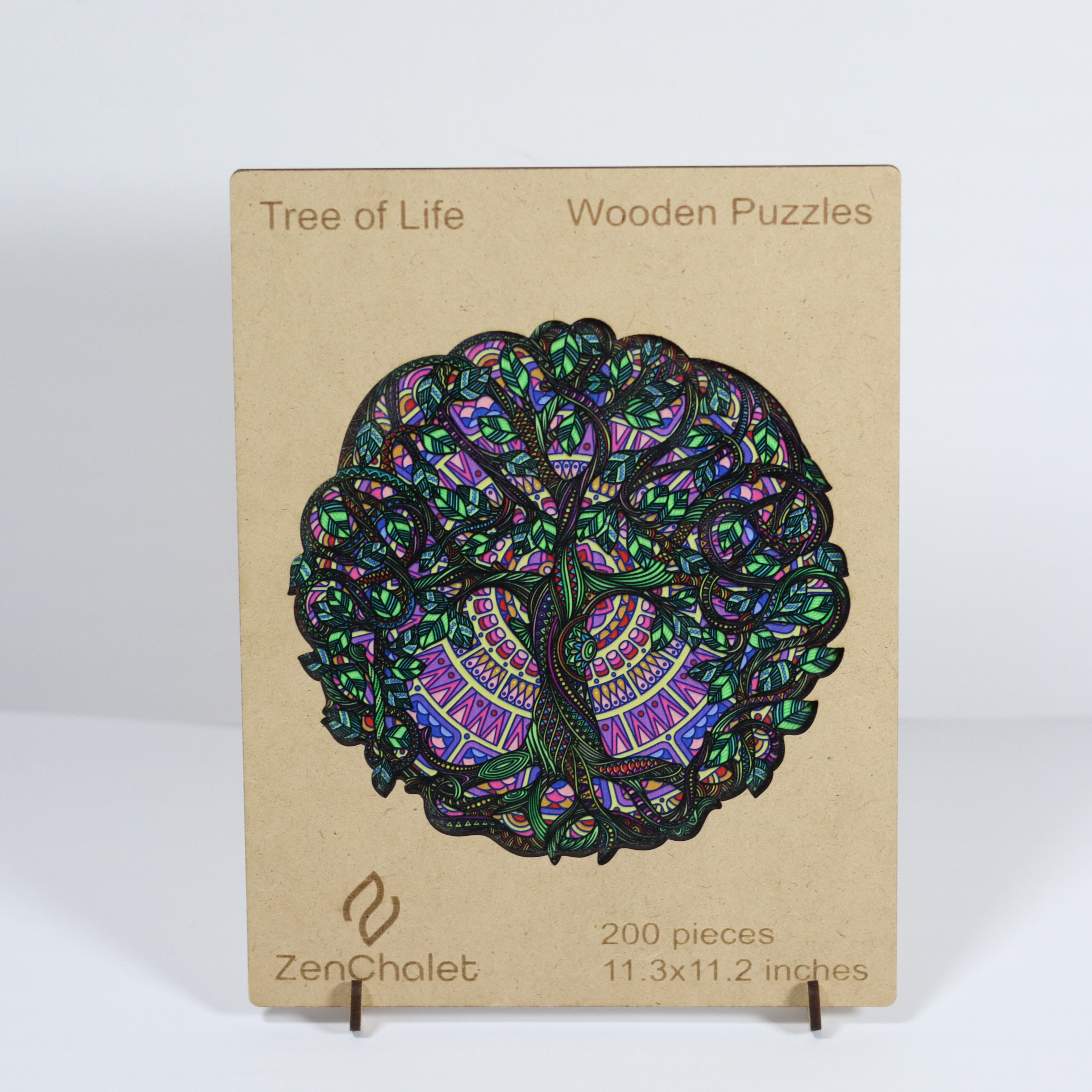 Wooden puzzle packaging with a colorful tree design on a beige background