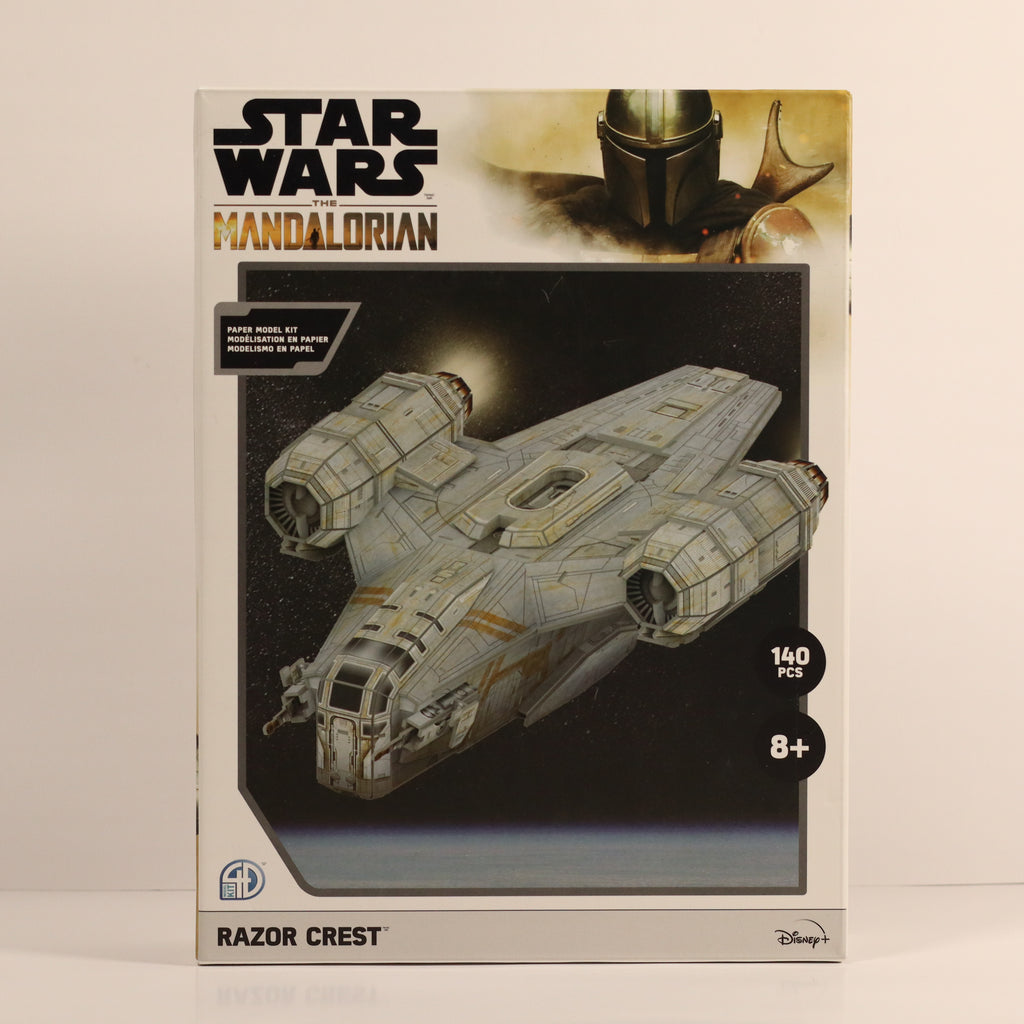 Star Wars Mandalorian Razor Crest model kit packaging on a beige background