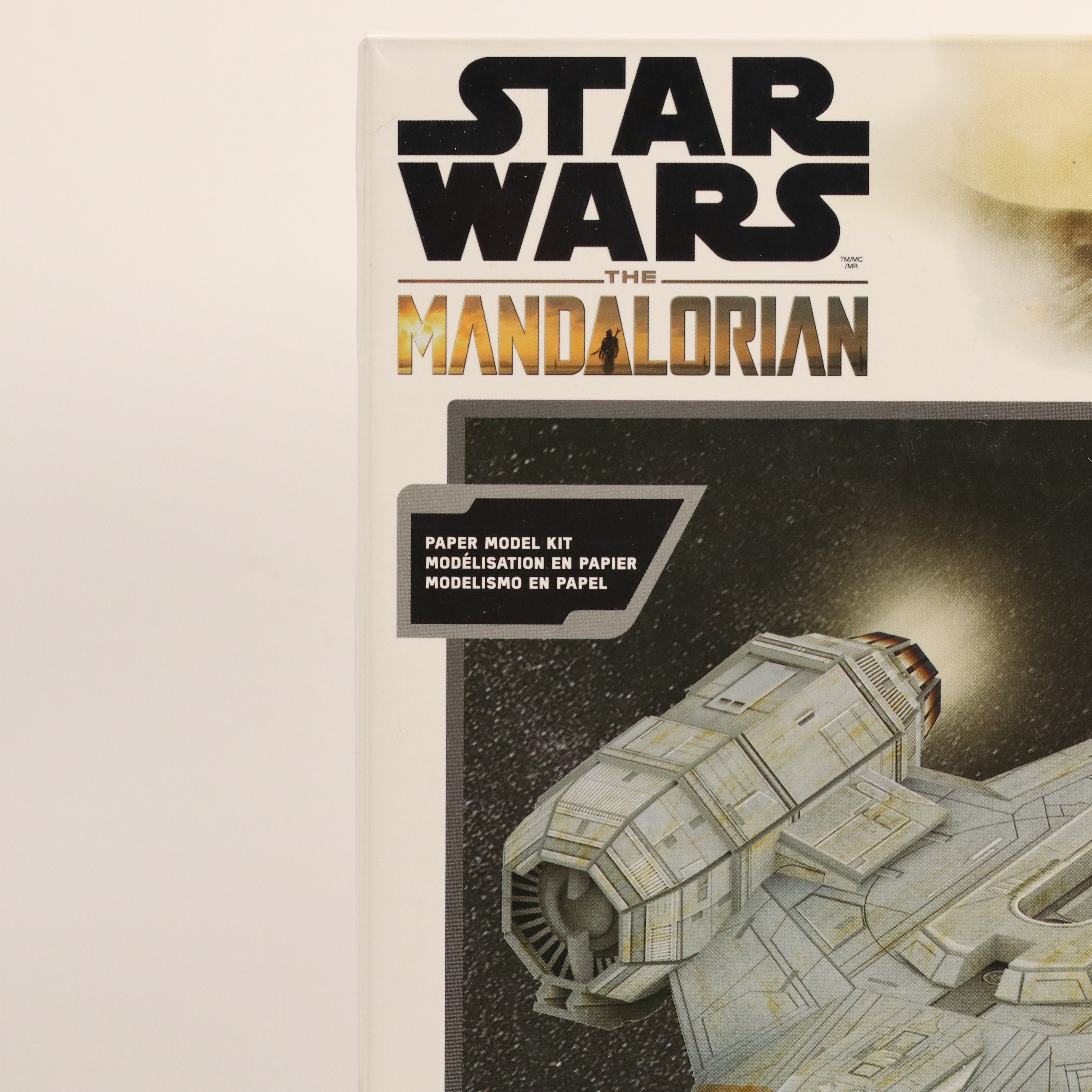 Star Wars The Mandalorian paper model kit packaging with spaceship illustration.