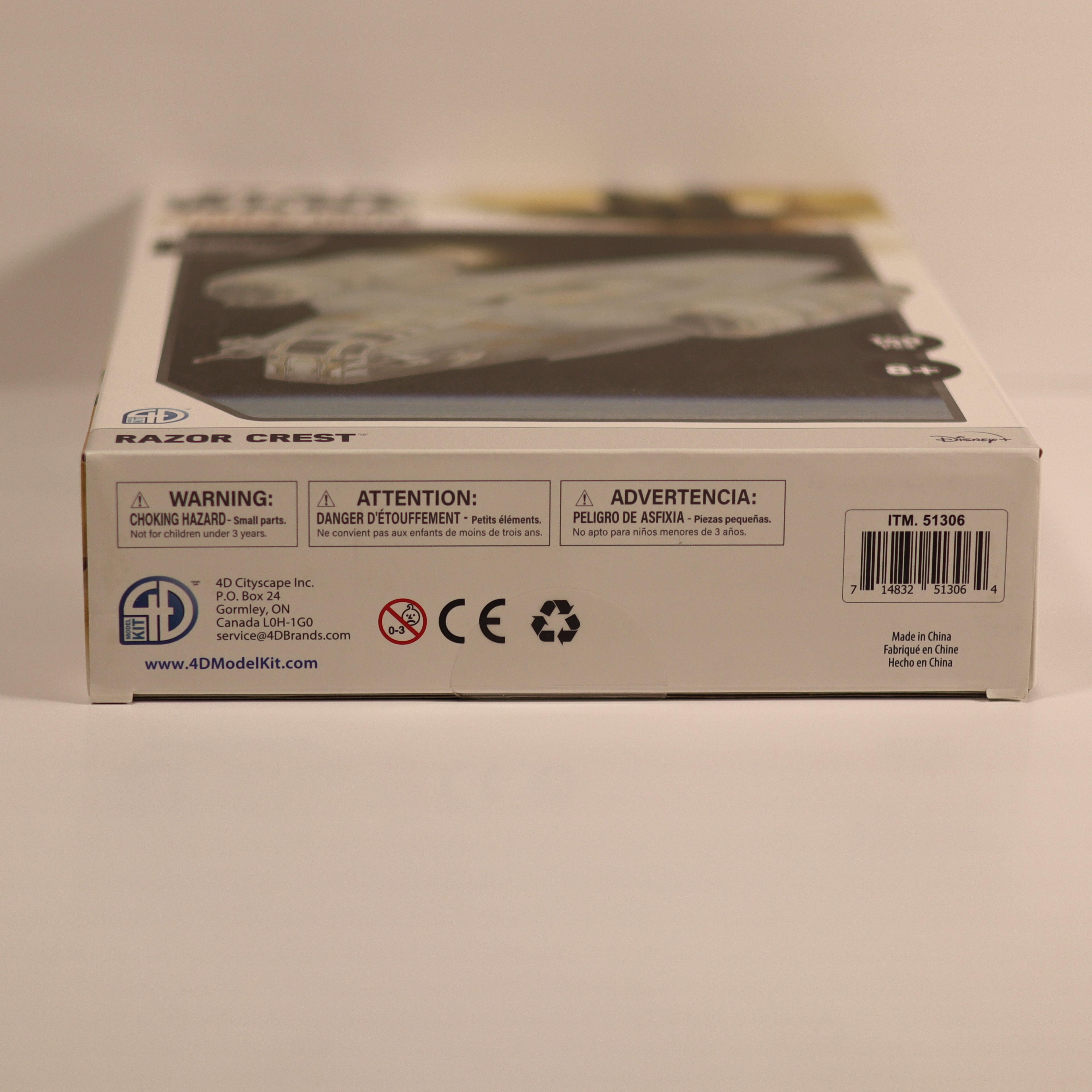 Model kit box with 'Razor Crest' branding on a neutral background