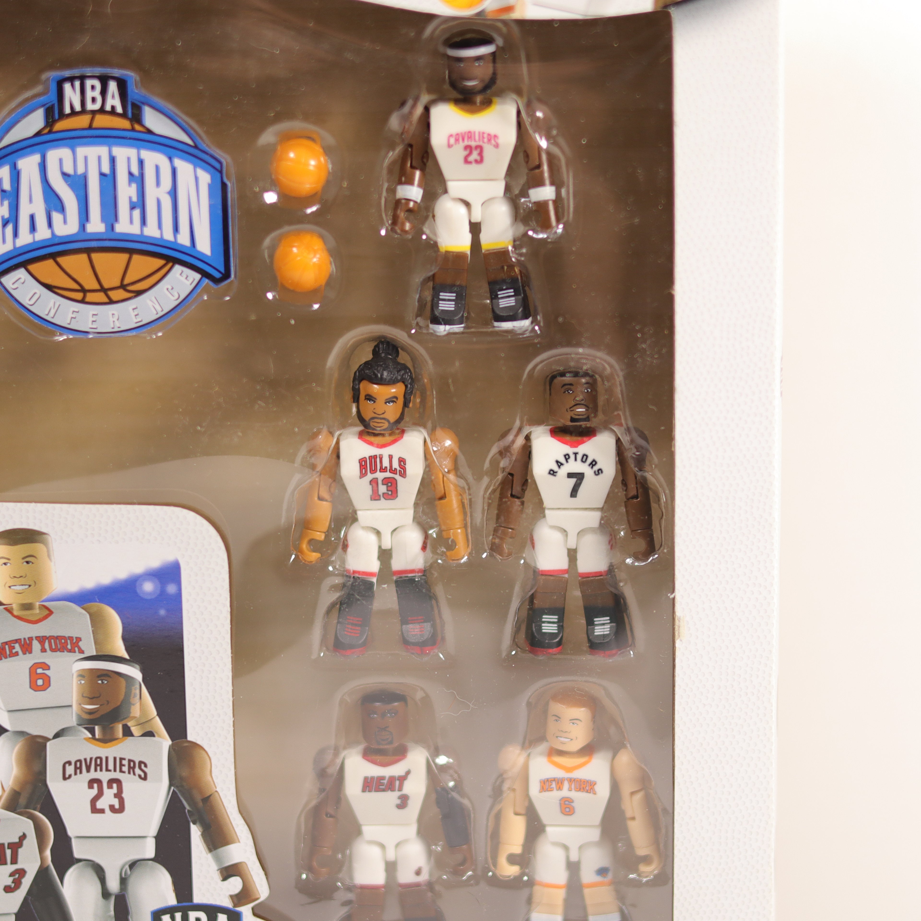 Packaged set of basketball player action figures with NBA branding