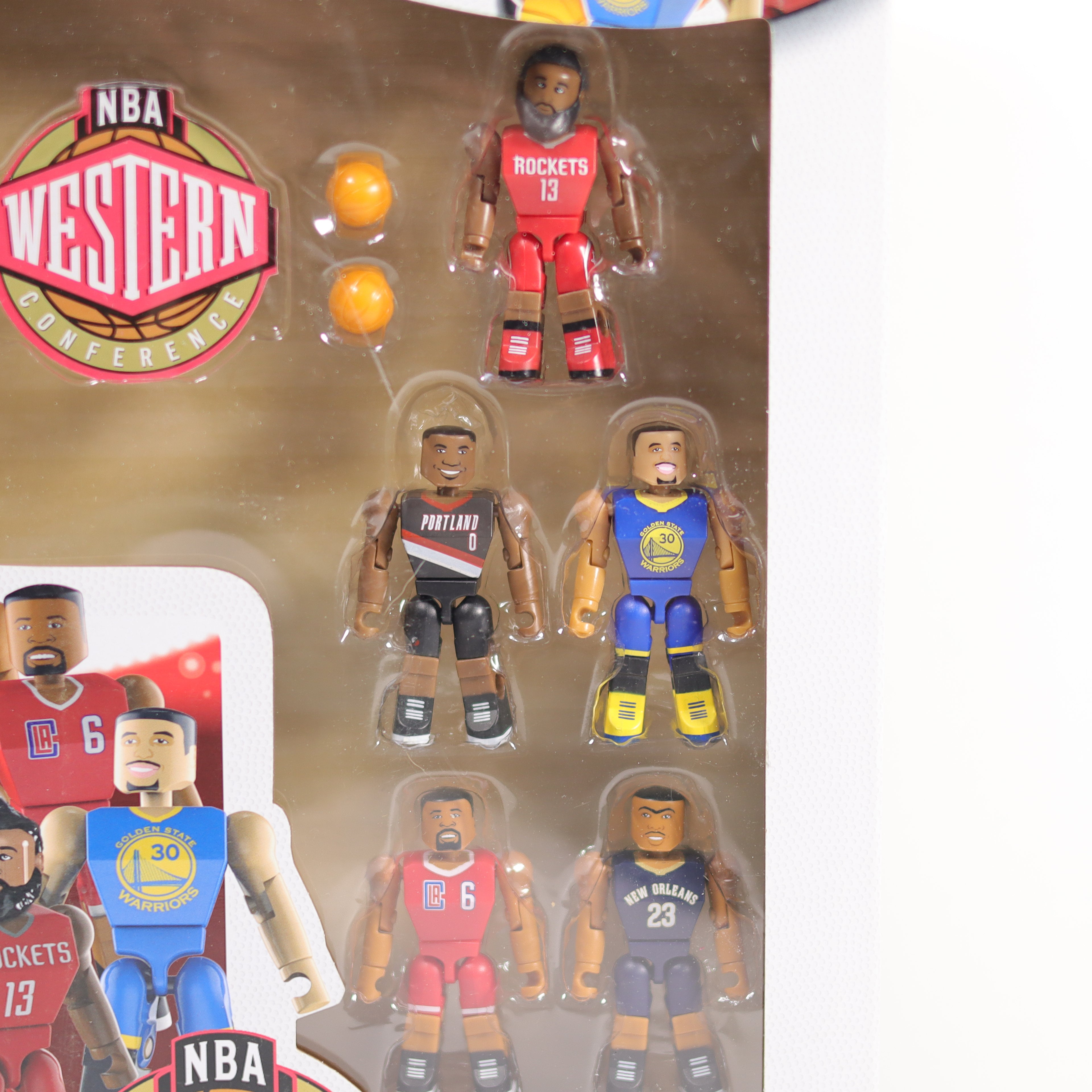Packaged set of basketball player action figures with NBA branding