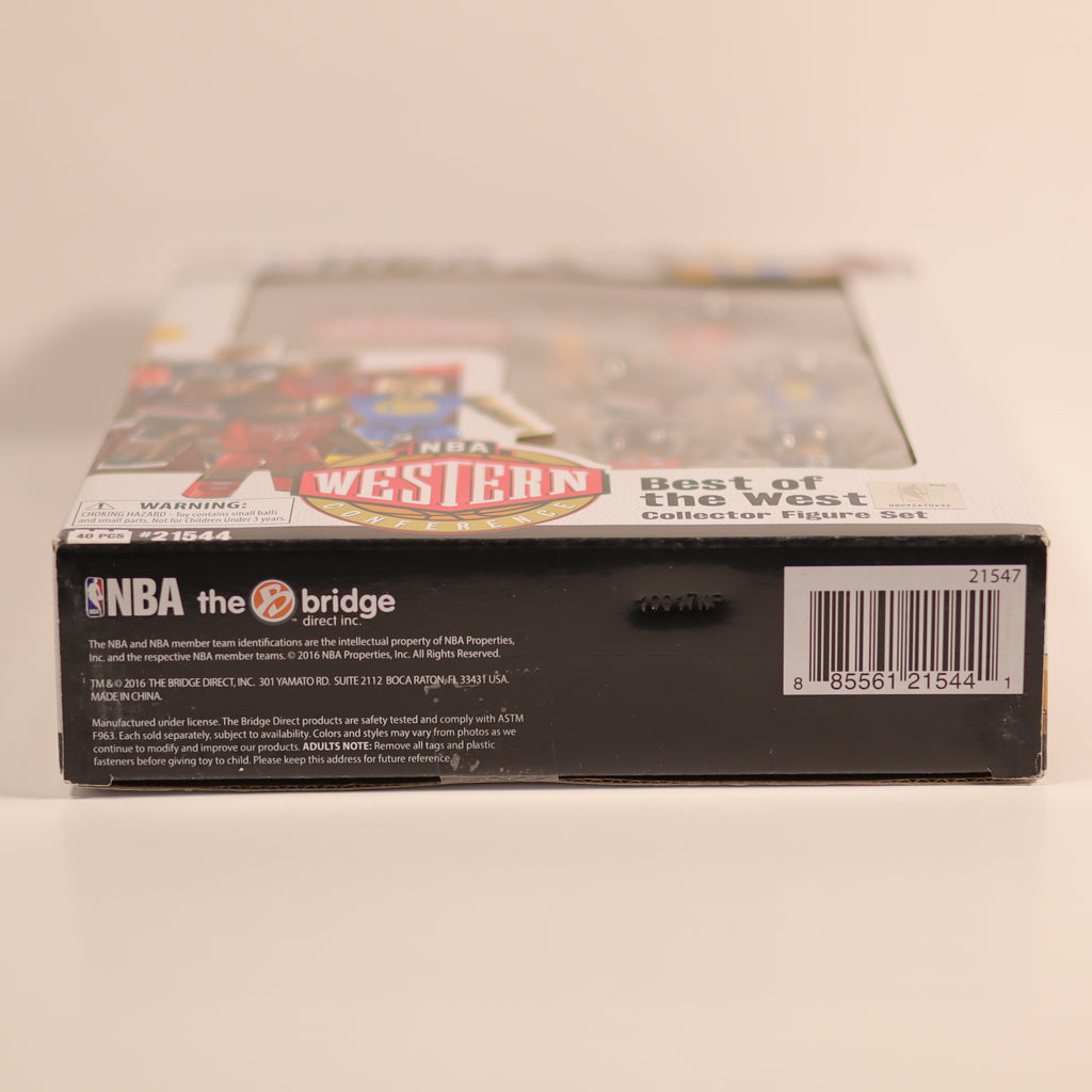 Box of NBA 'Best of the West' Collector Figure Set on a beige background