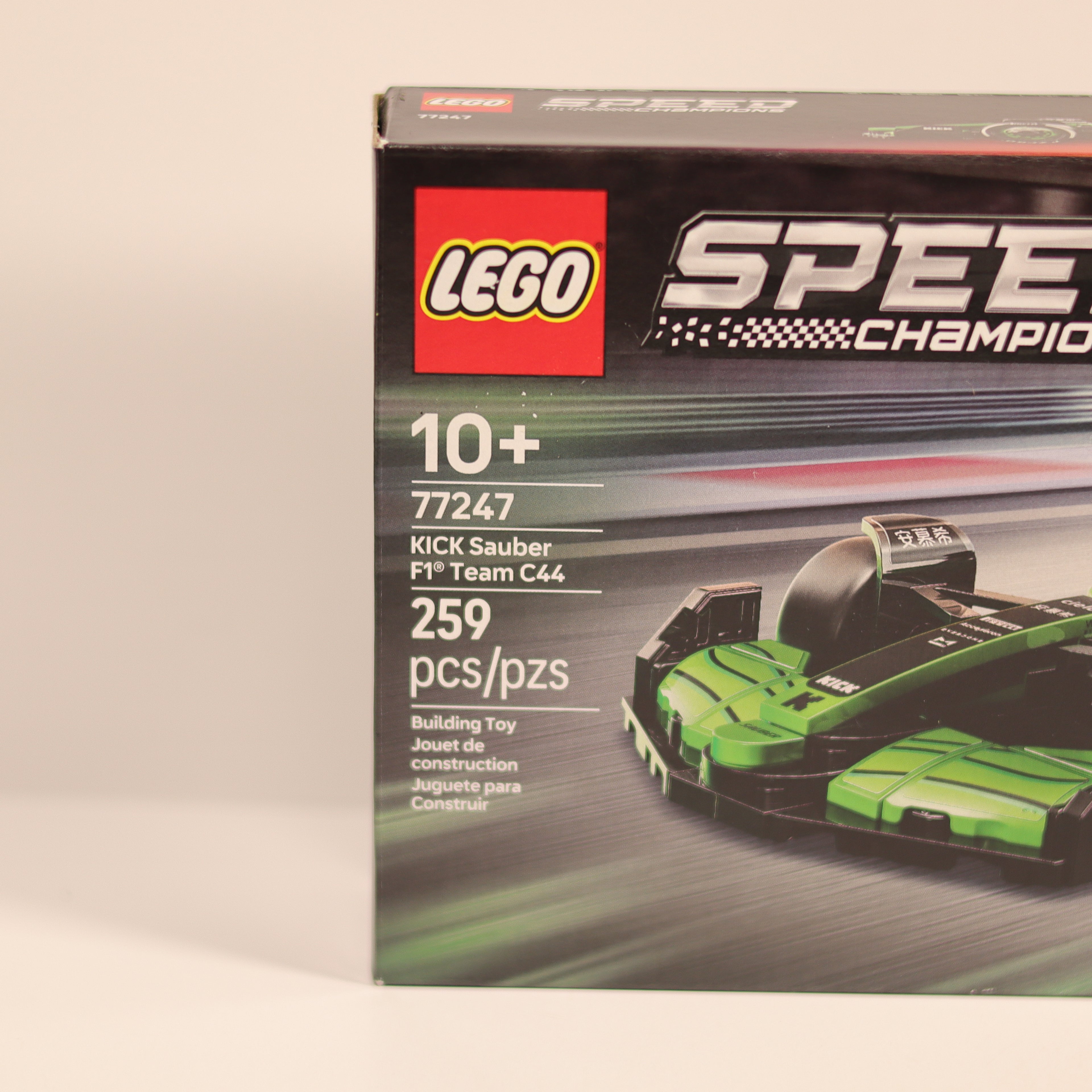 LEGO Speed Champions KICK Sauber F1 Team C44 packaging on a beige background