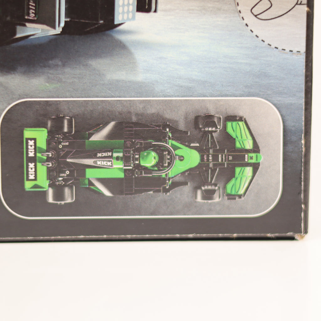 Model Formula 1 car on a display stand with 'Kiek' branding.