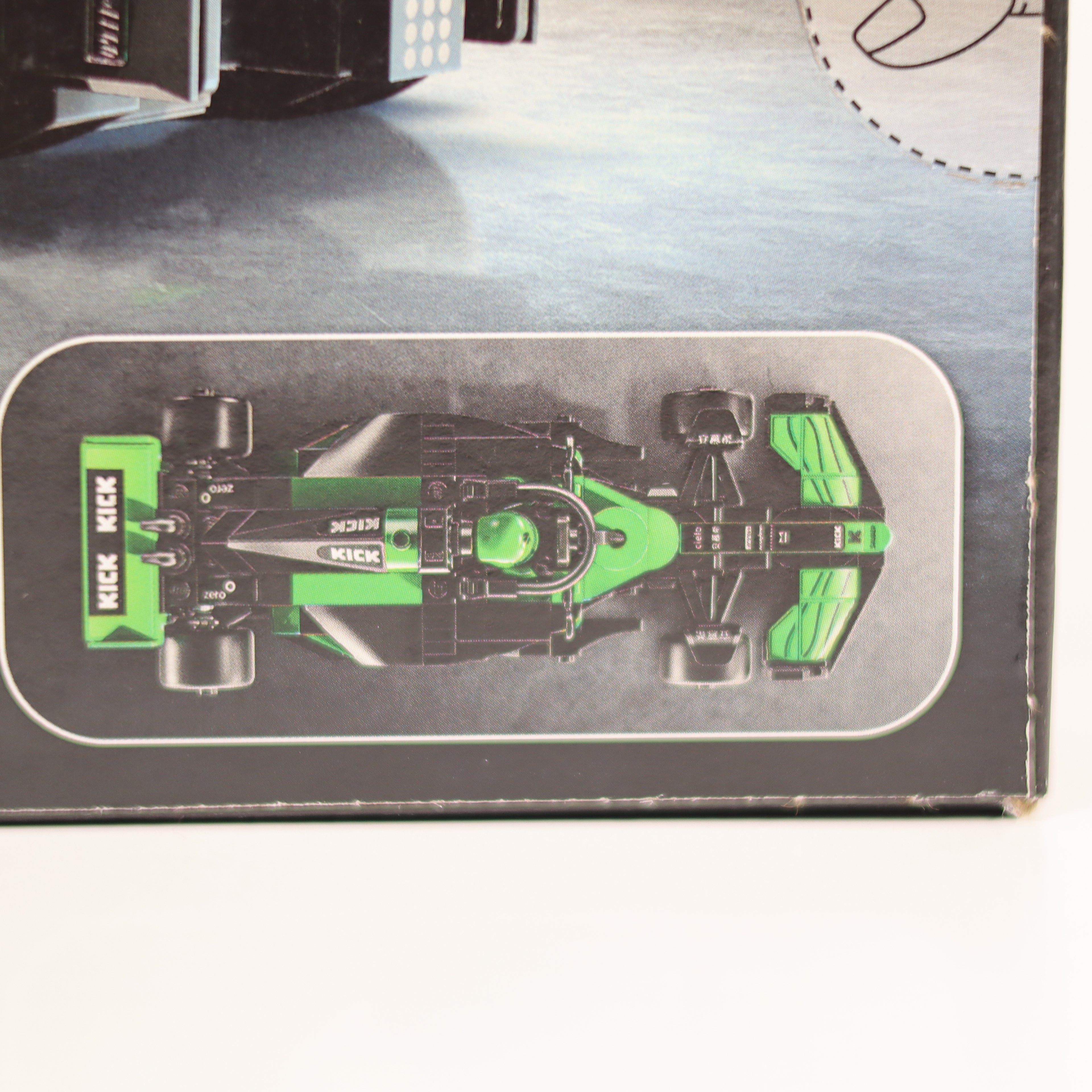 Model Formula 1 car on a display stand with 'Kiek' branding.