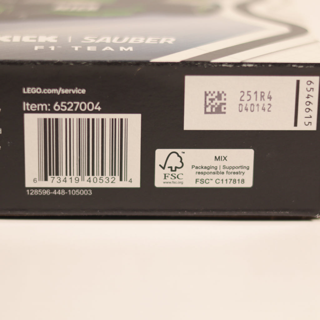 Close-up of a LEGO product packaging with barcodes and text.