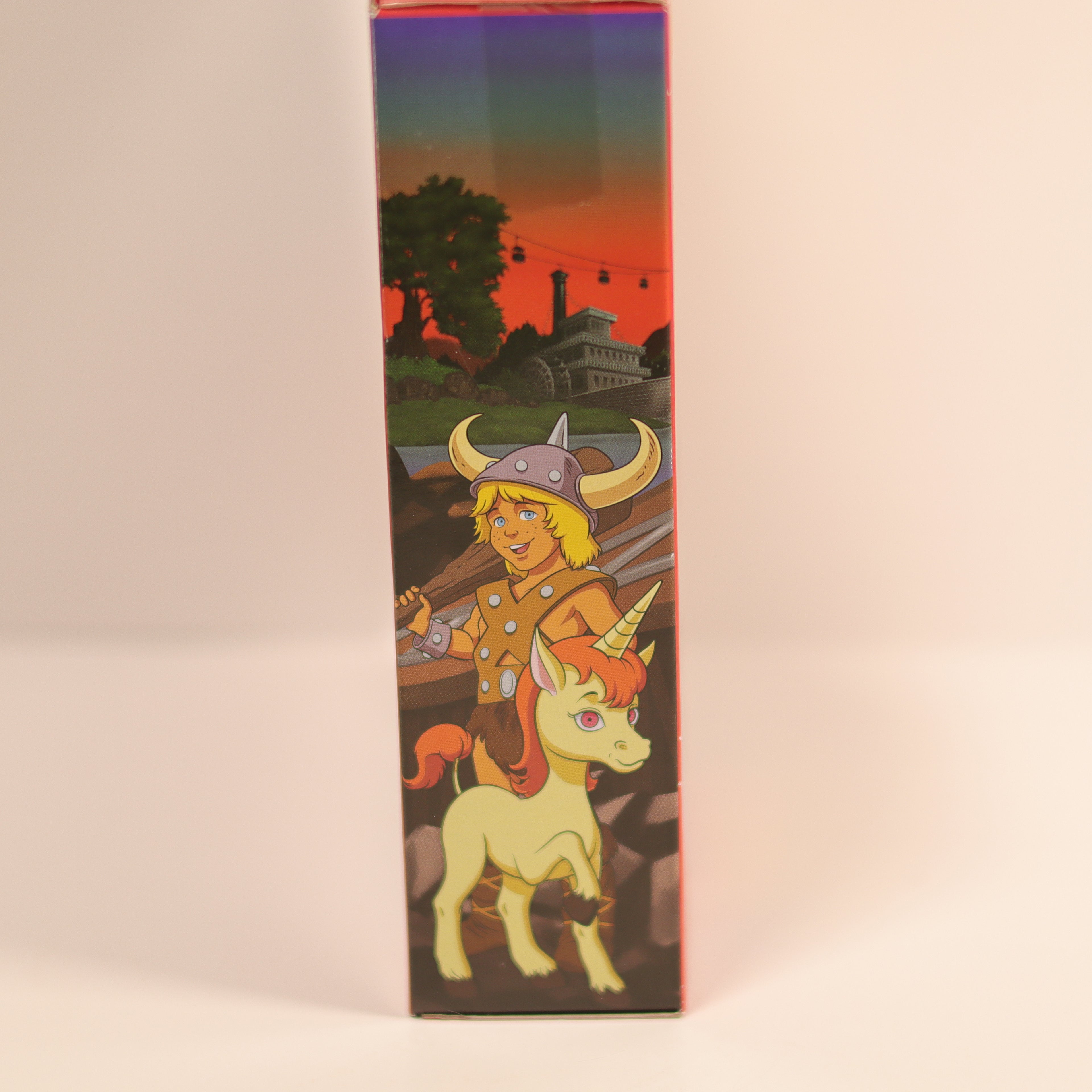 Cartoon character with a unicorn on a colorful box