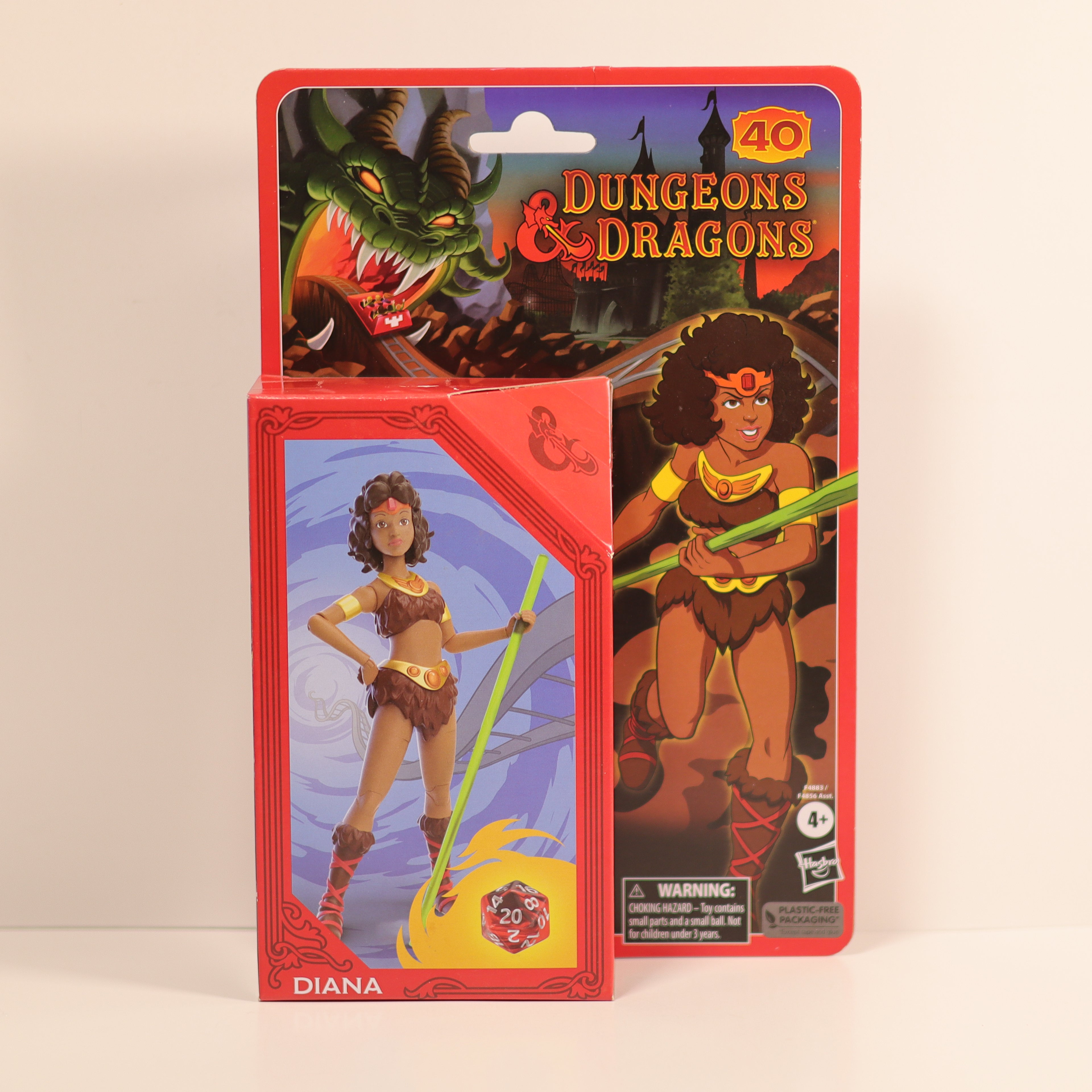 Dungeons & Dragons action figure packaging with character illustration on a beige background