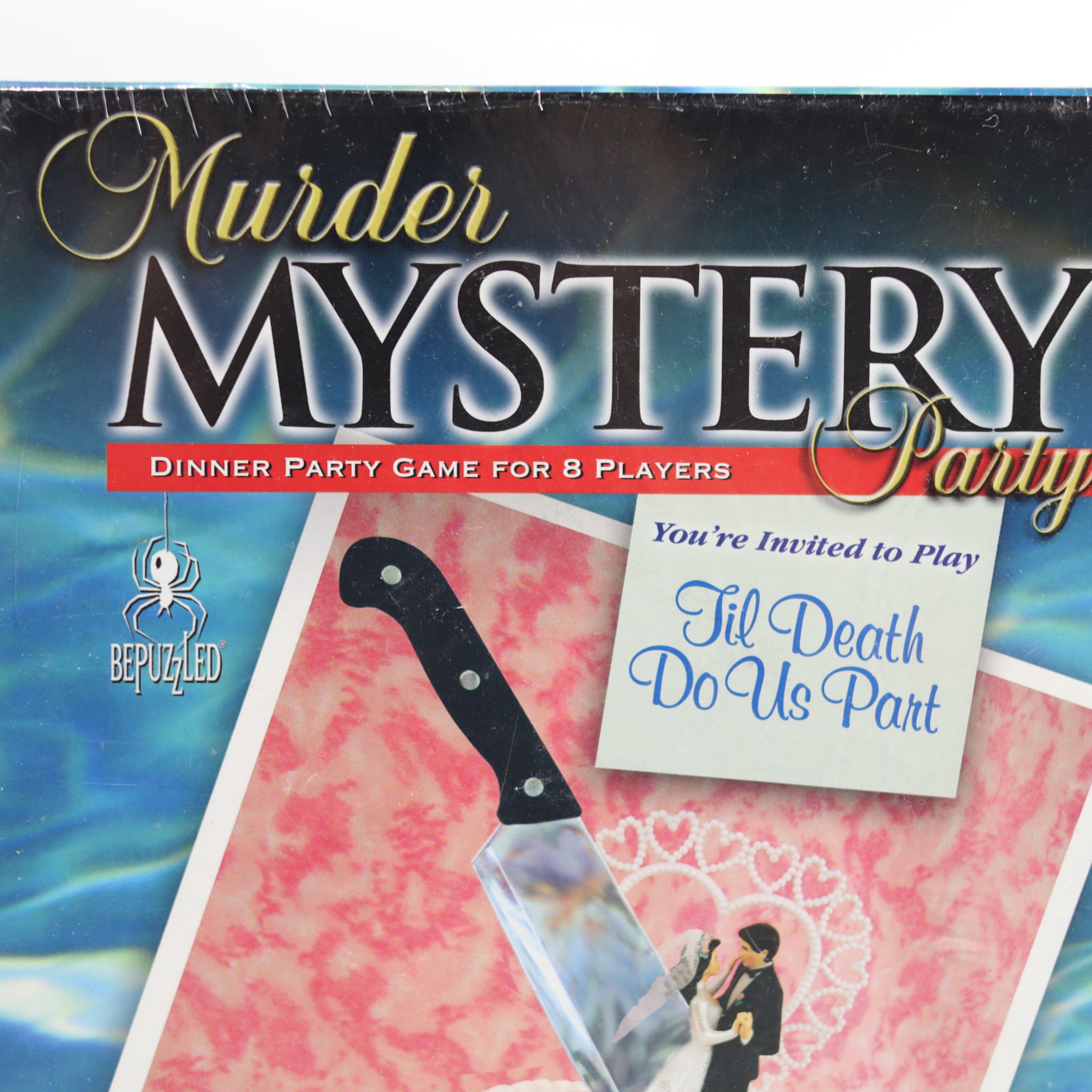 Box for a murder mystery dinner party game with a knife and card on a colorful background.