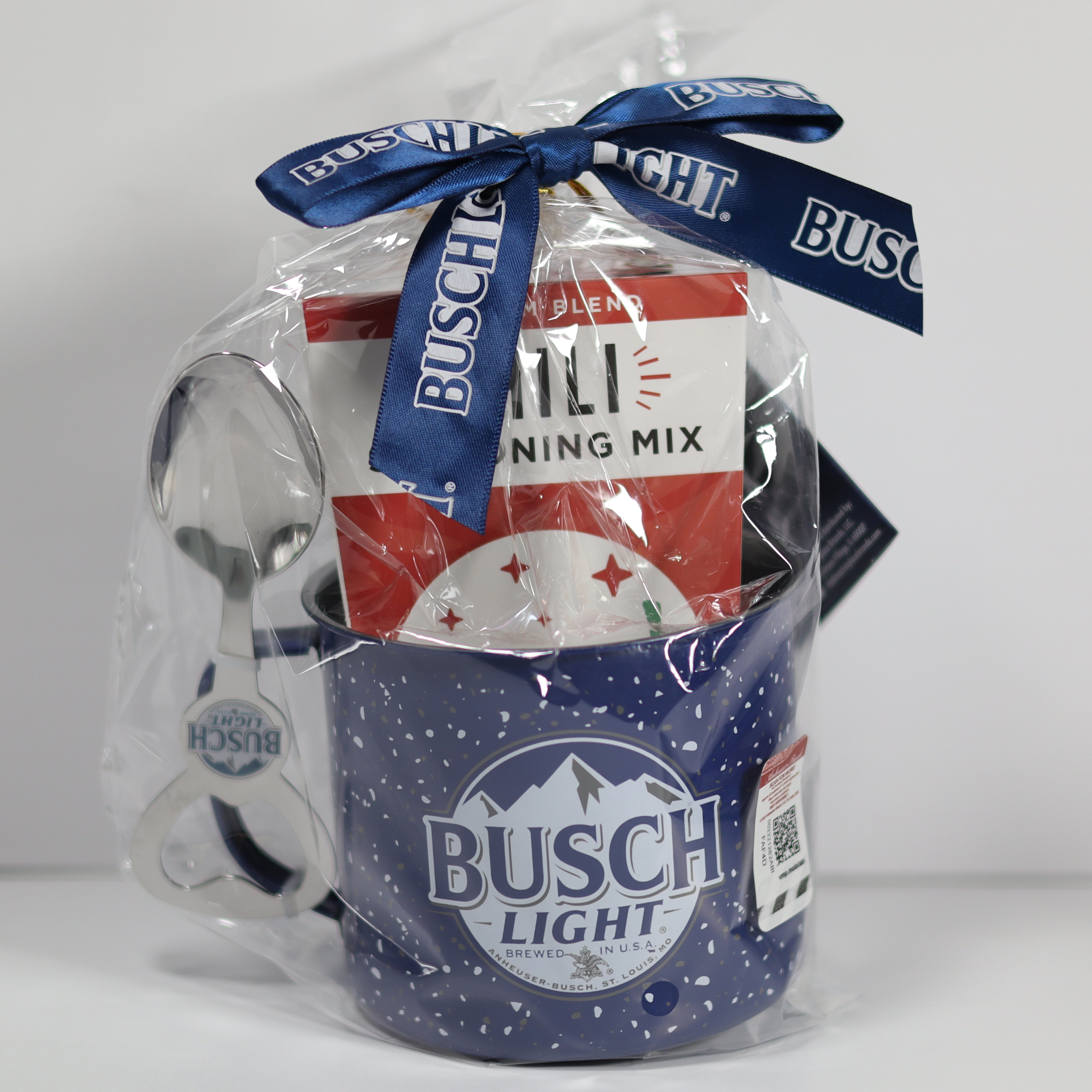 Gift set with Busch Light mug, spoon, and baking mix in clear packaging.