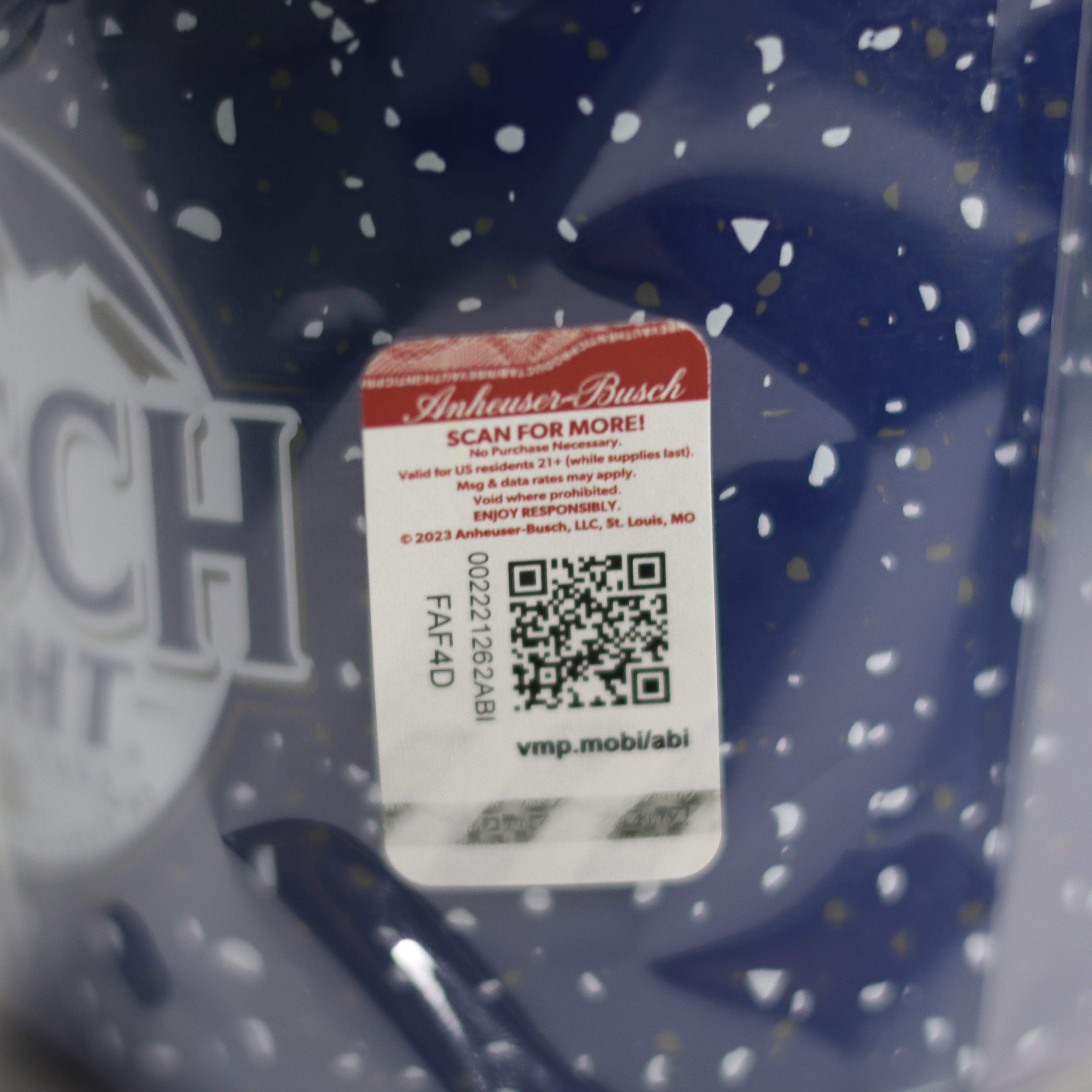 Close-up of a Budweiser bottle cap with a QR code label.