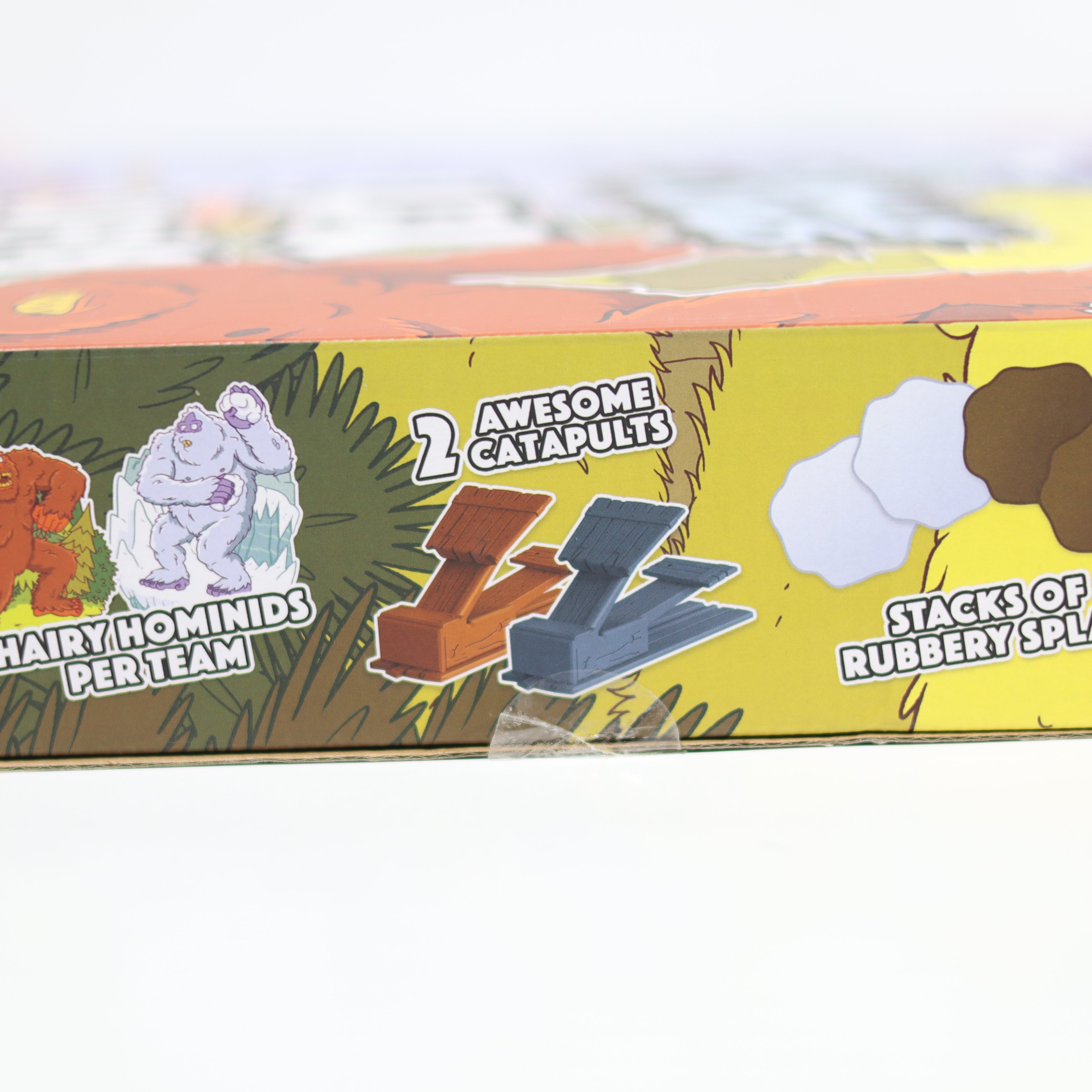 Toy packaging with illustrations of characters and text on a white background
