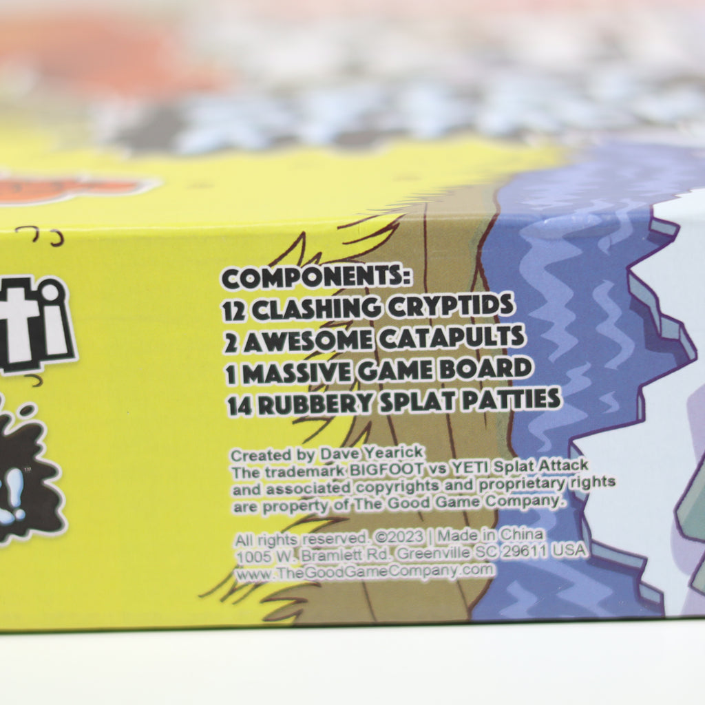 Yetti game box with component list on a blurred background