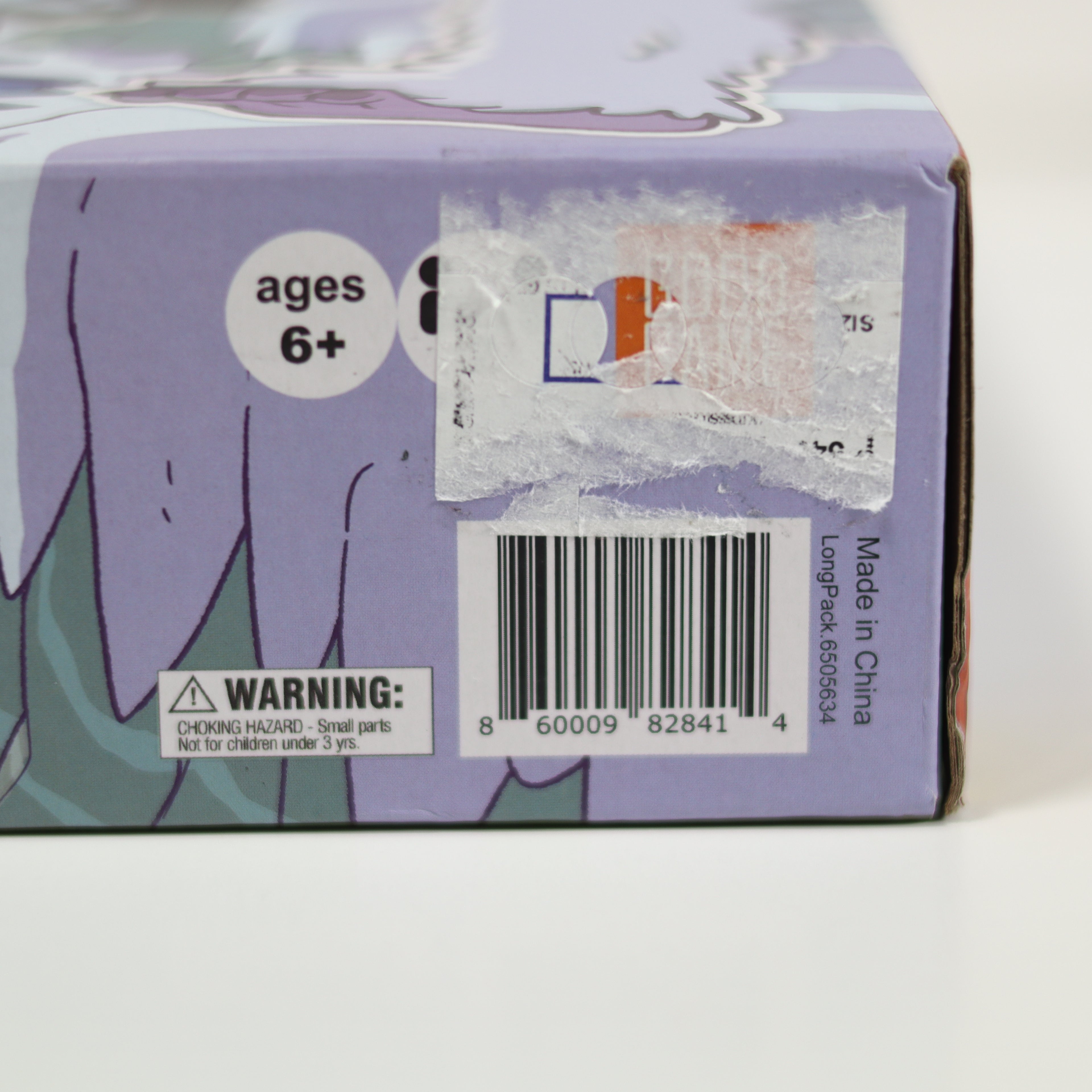 Product packaging with age restriction, warning label, and barcode on a white background