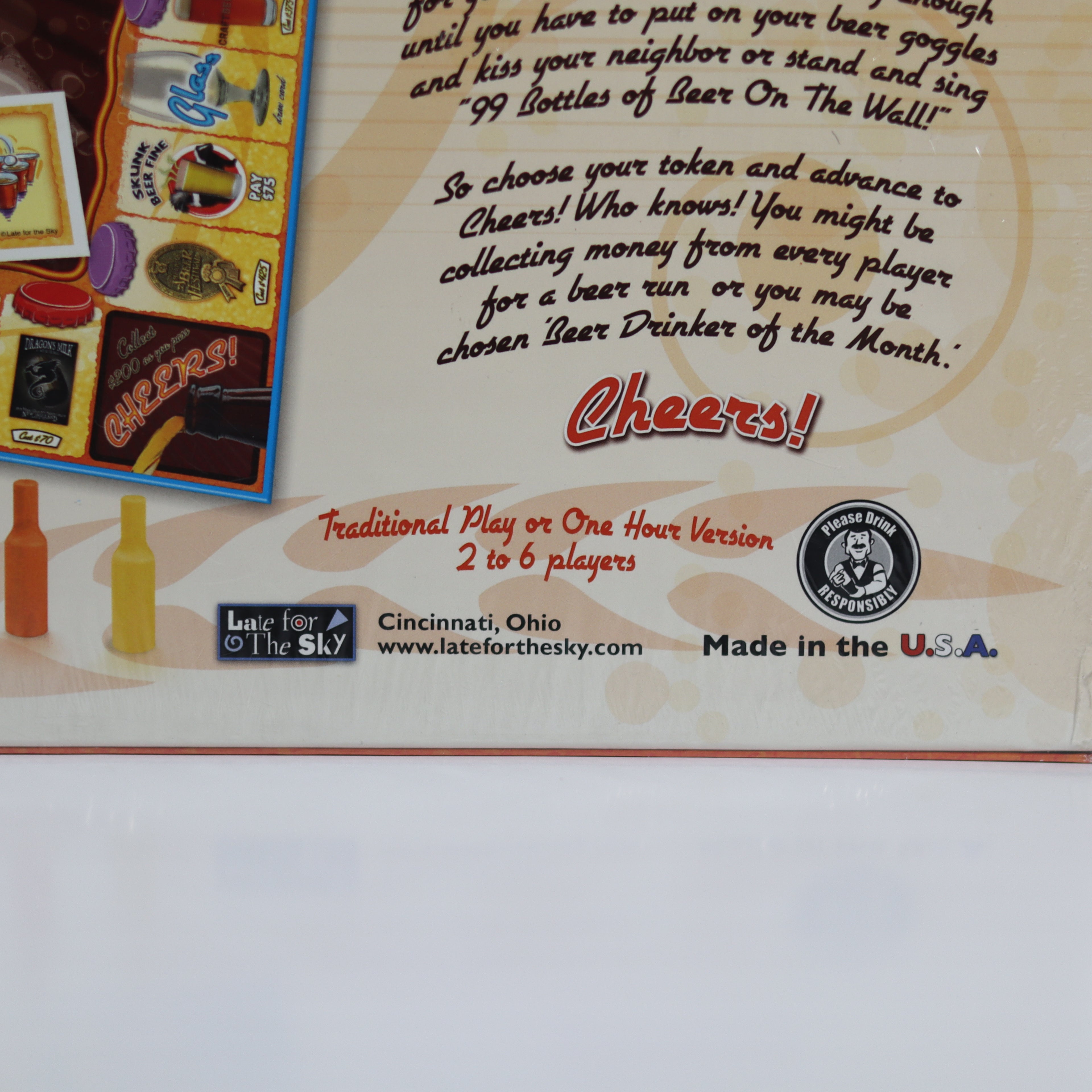 Board game packaging with text and graphics on a white background