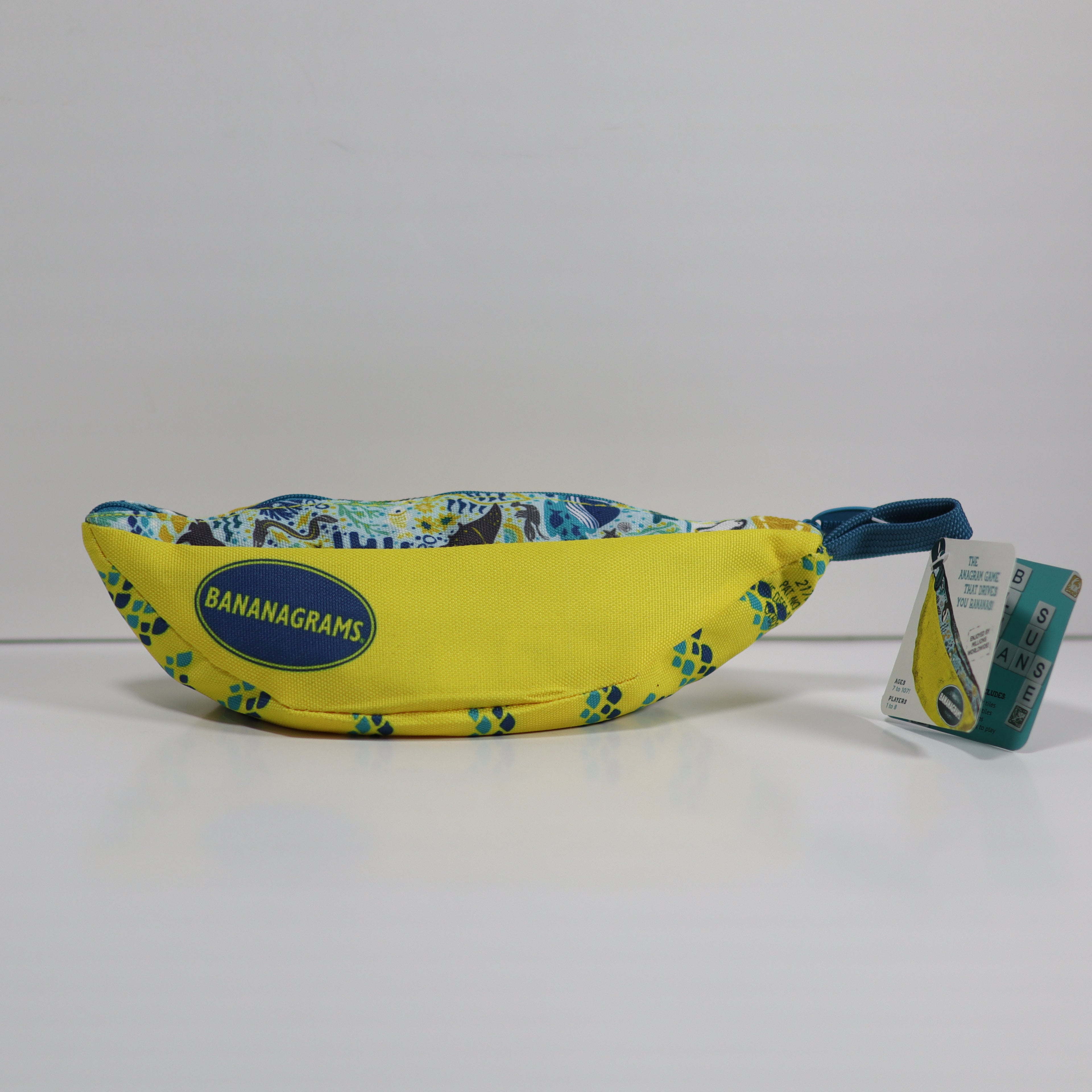 Yellow fanny pack with blue accents and 'Bananagrams' branding on a white background