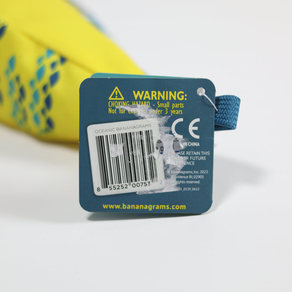 Blue warning label with text and a barcode on a white background