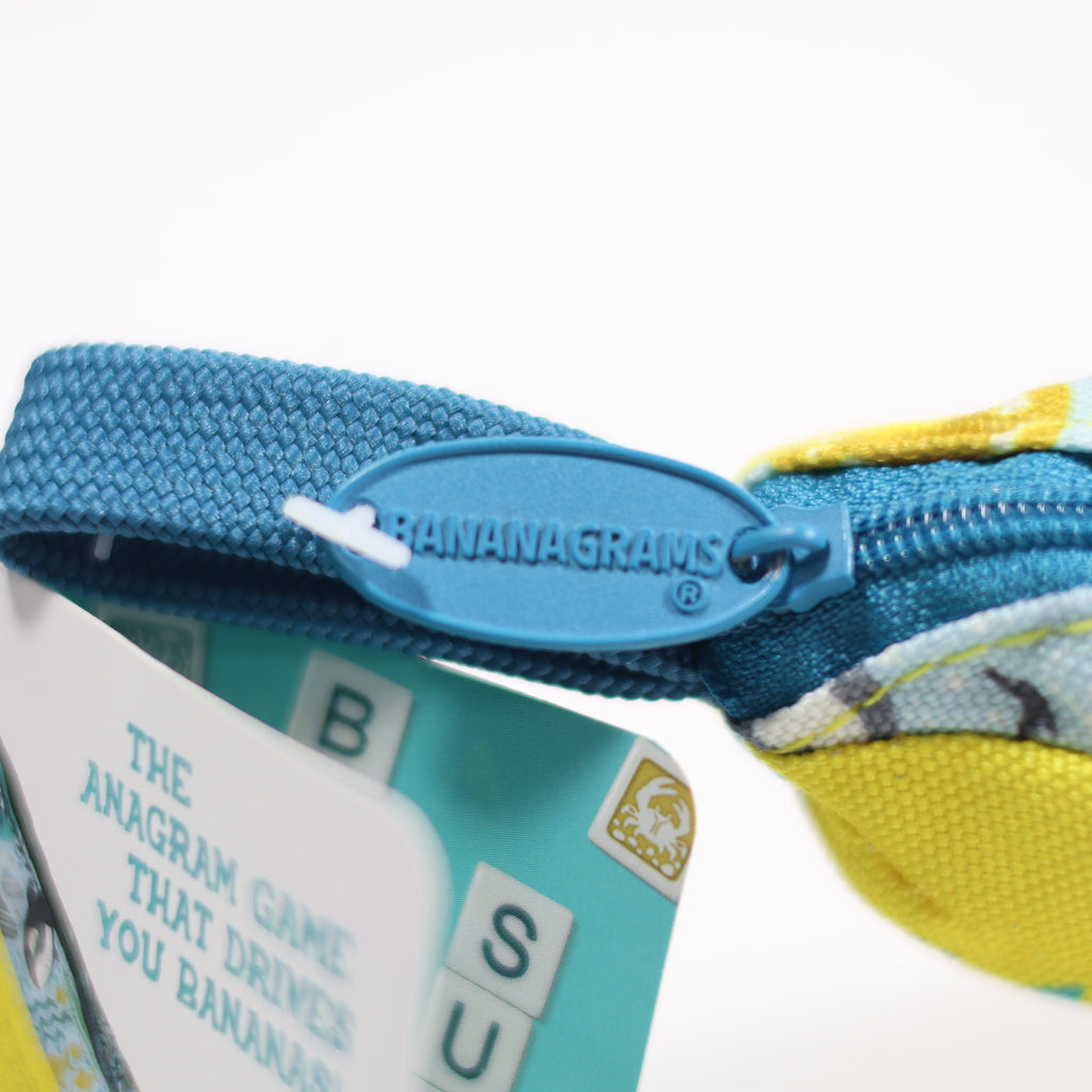 Close-up of a blue zipper on a product with 'Bananagrams' branding.