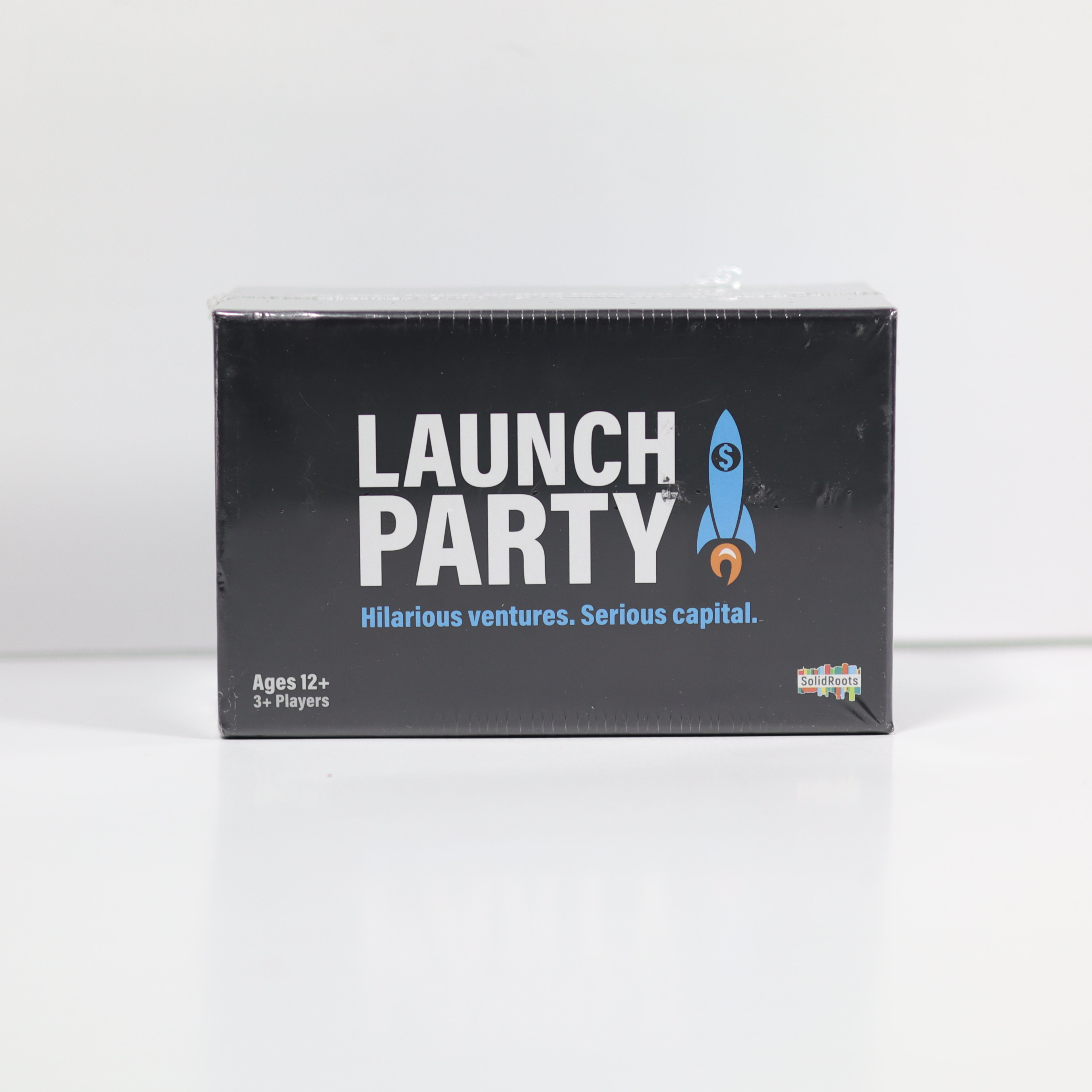 Box of 'Launch Party' game with rocket graphic on a white background