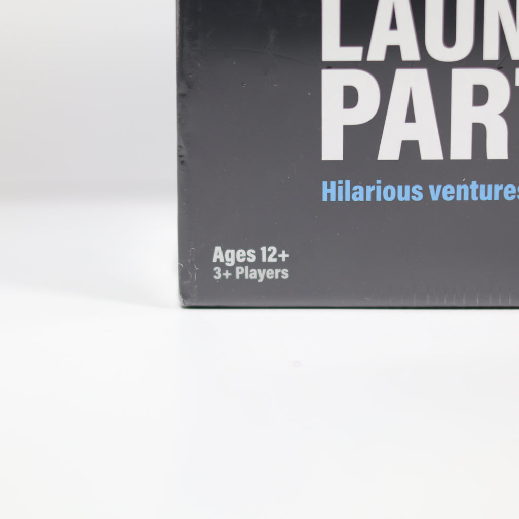 Game box with 'Laundry Party' text and age recommendation on a white background