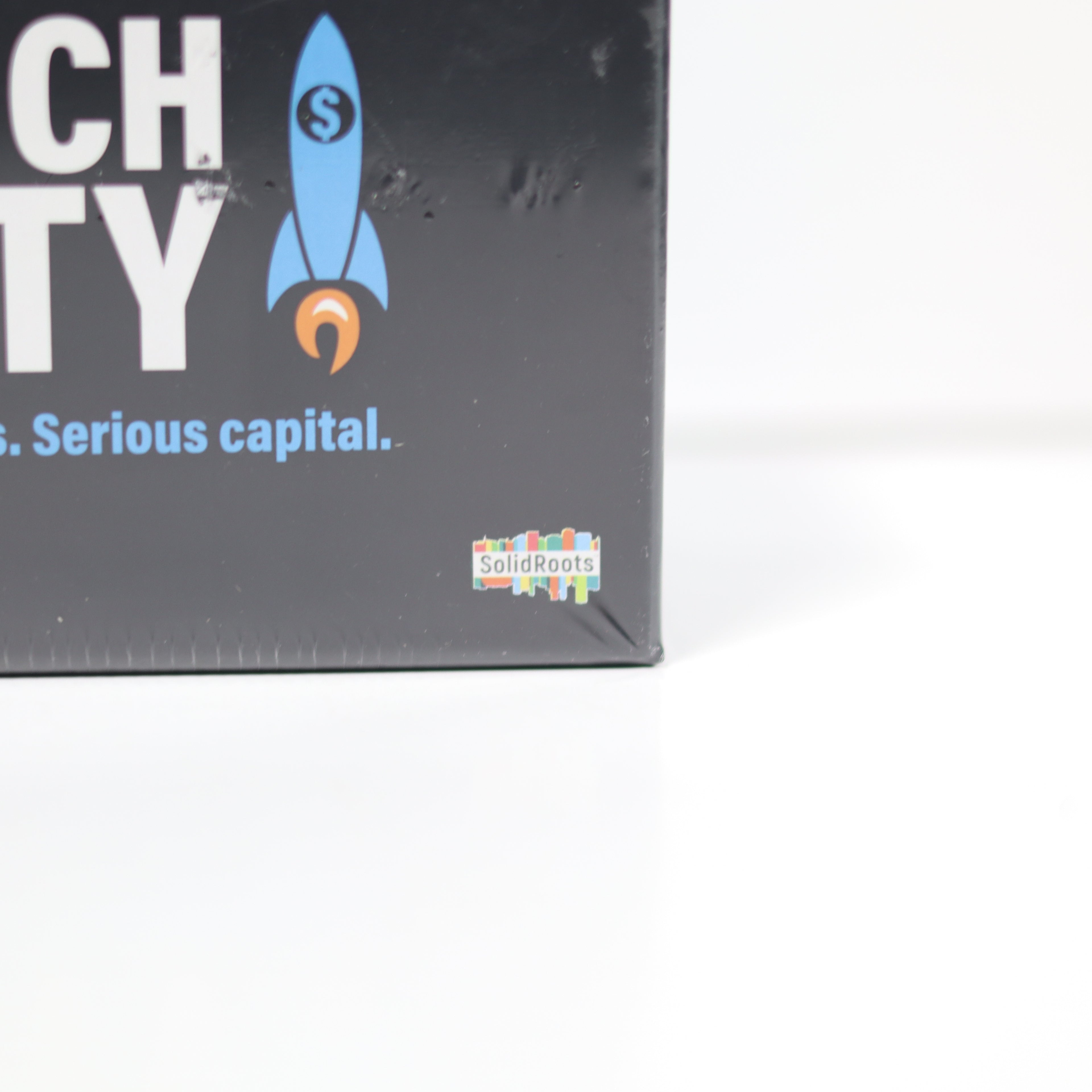 Product packaging with a rocket graphic and text on a white background