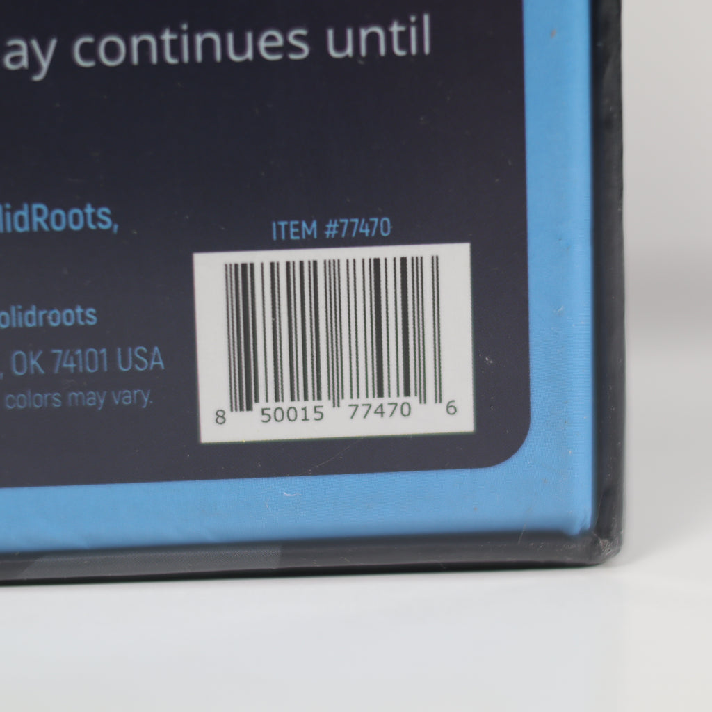 Close-up of a product label with a barcode on a blue background