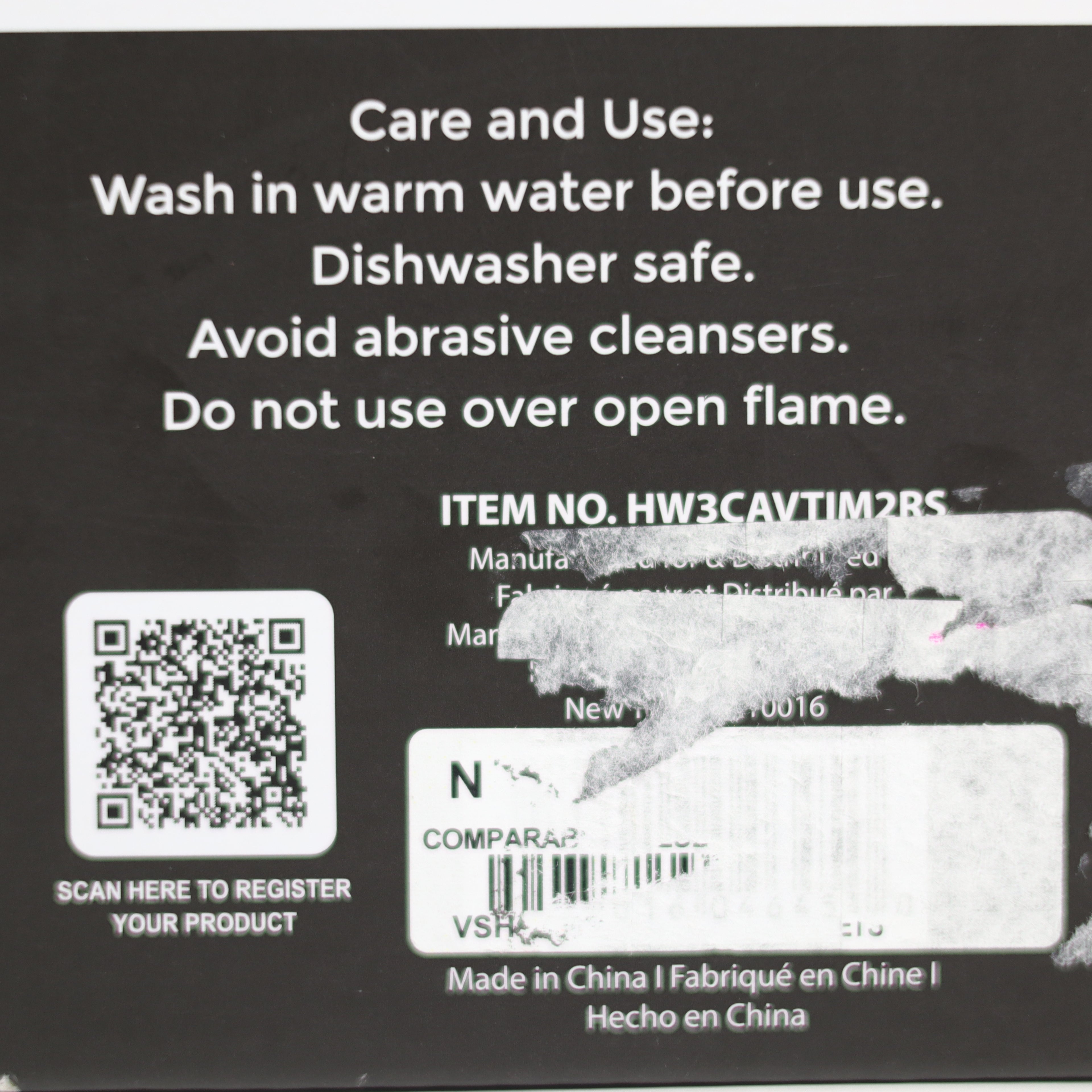 Product label with care and use instructions, item number, and QR code on a black background.