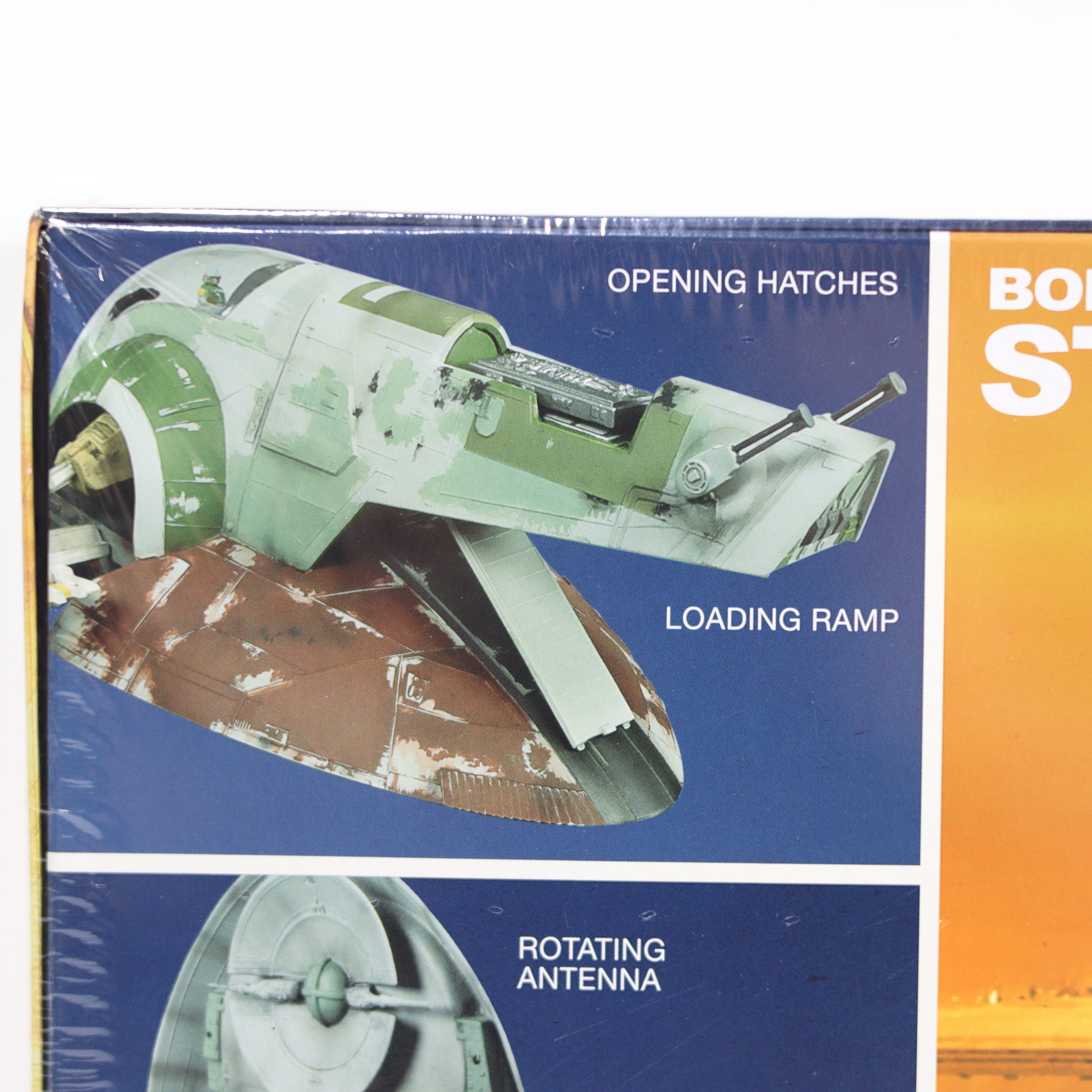 Model spaceship packaging with features highlighted on a blue and orange background