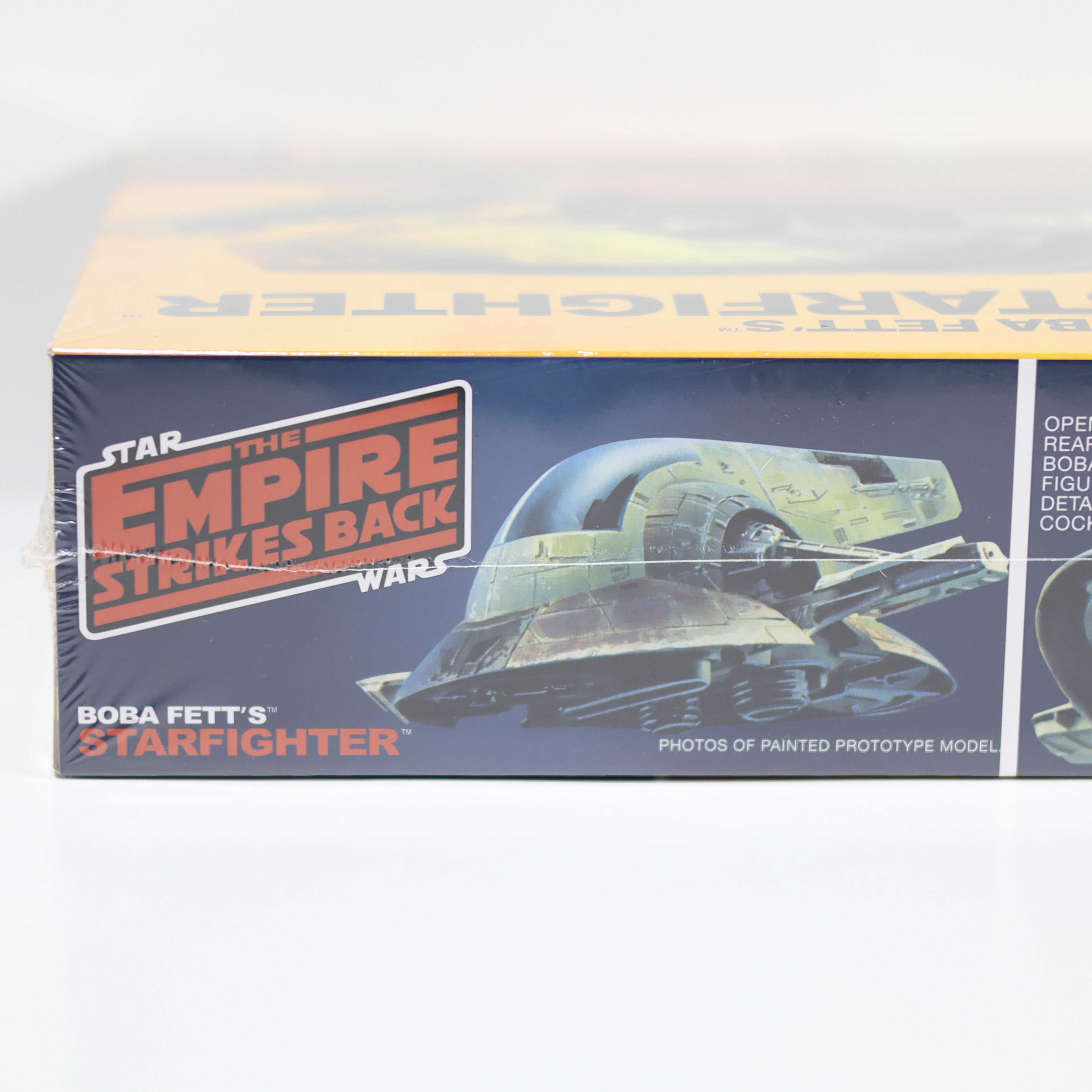 Box for Boba Fett's Starfighter from 'The Empire Strikes Back' with 'Star Wars' branding.
