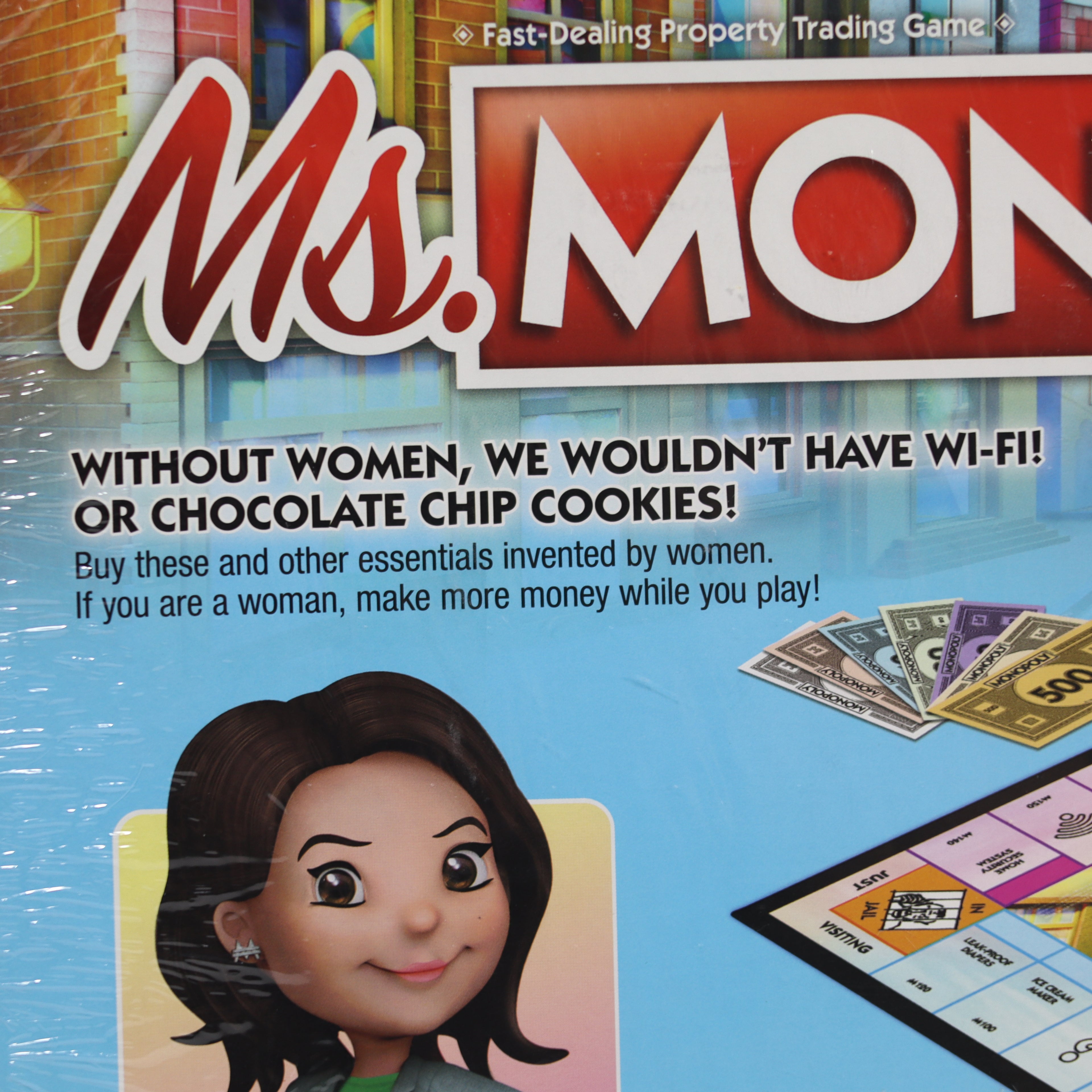 Board game box with 'Ms. Monopoly' branding and promotional text.