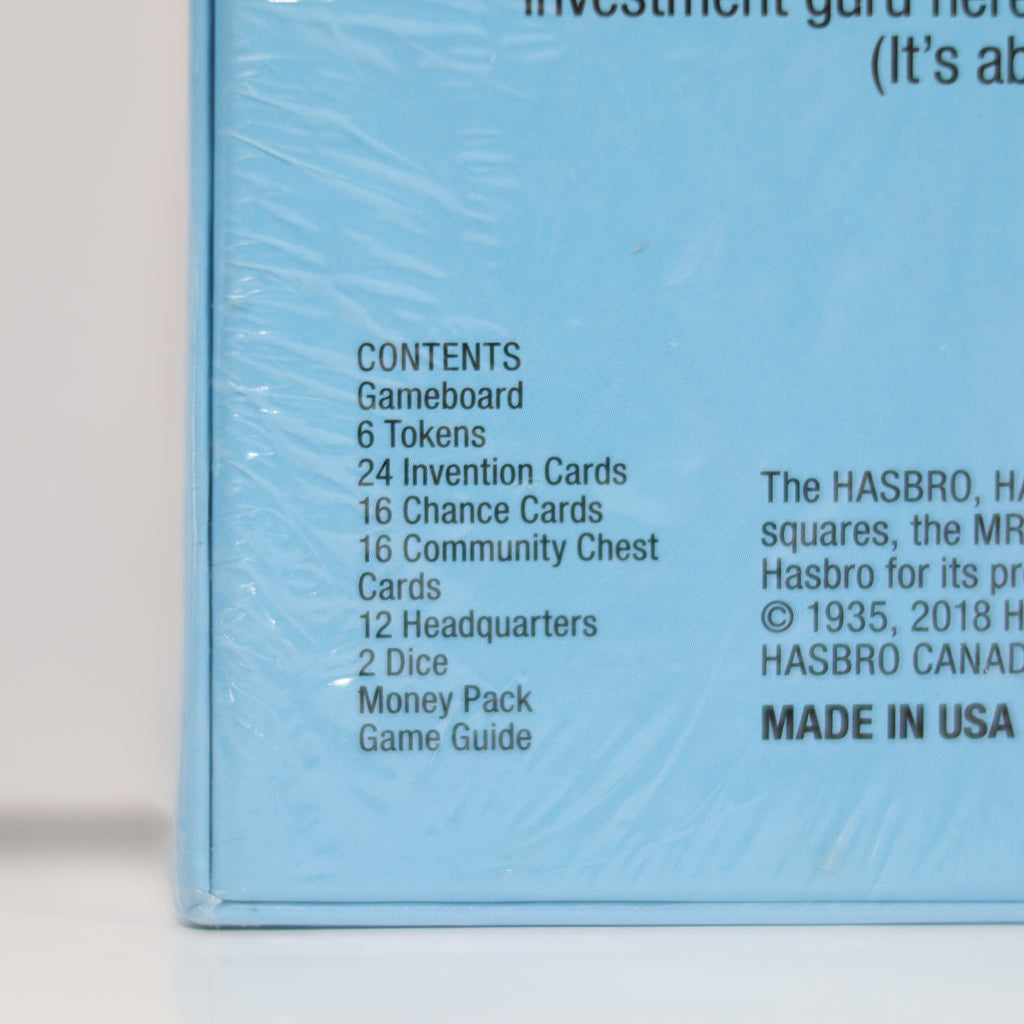 Back of a board game box with contents list and Hasbro branding.